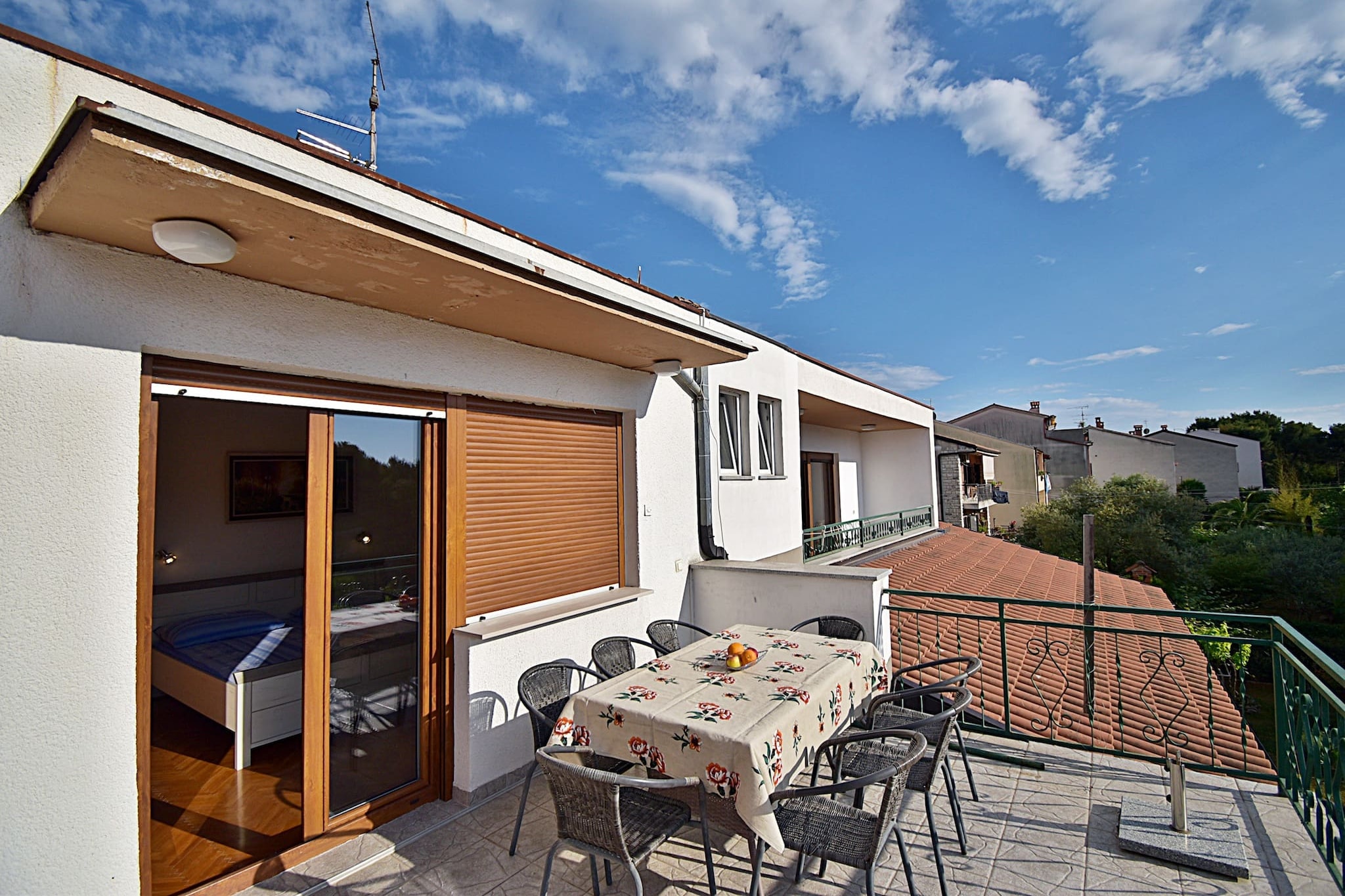 On the 1st floor: (Kitchen(hob, electric kettle, toaster, coffee machine, oven, fridge, freezer, dishes and cutlery), Living/diningroom(TV, dining table, seating area), bedroom(Queen Bed), bedroom(double king size bed), bedroom(single bed, single bed), bathroom(bath tub), bathroom(shower), toilet(toilet), toilet(toilet), Internet access)\n\nGarden Furniture , balcony, air conditioning, terrace, parking, ironing board, iron, hairdryer, Essentials