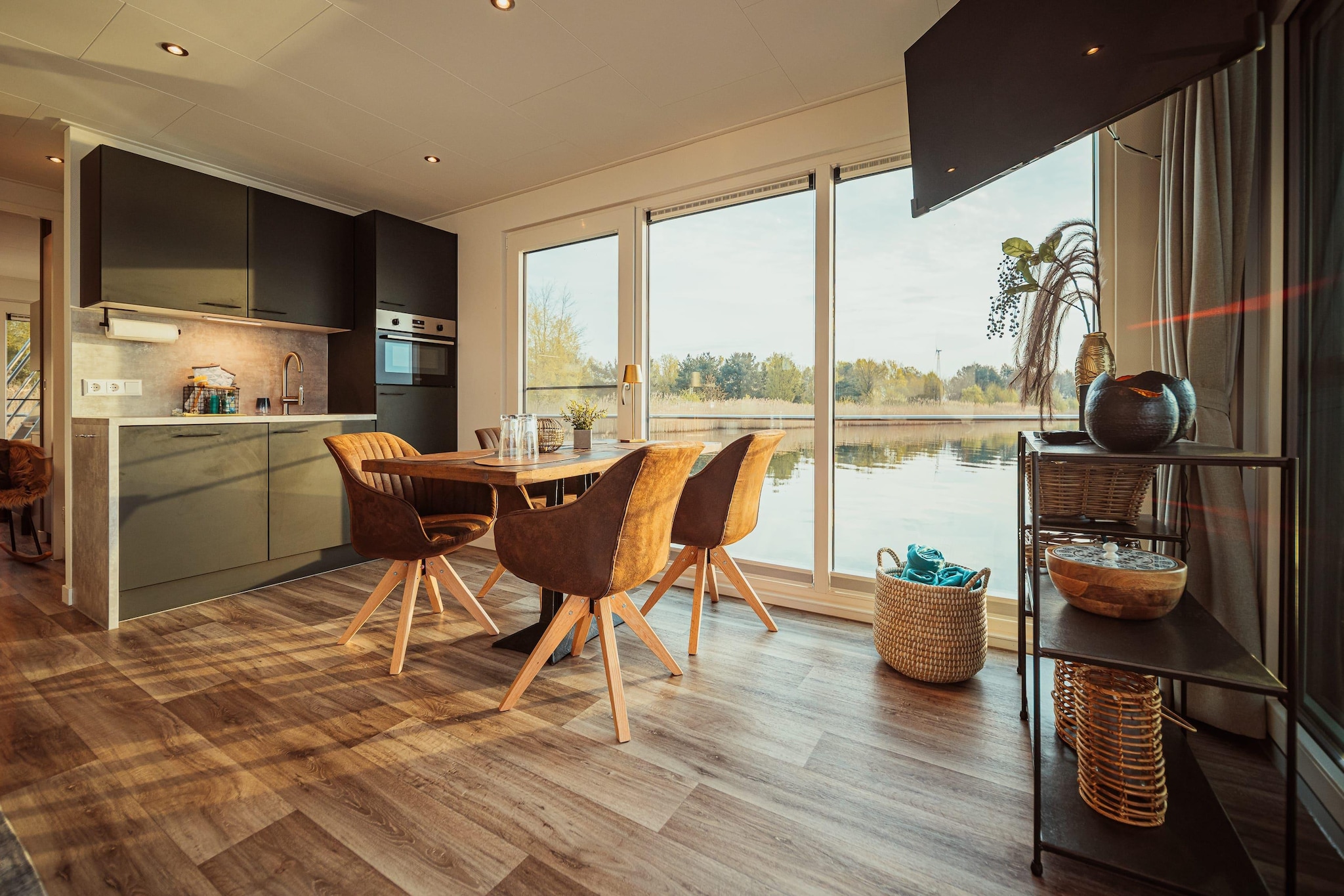 Located just 10 meters from the tranquil shores of Gräbendorfer See, this elegant ground-floor holiday home in Vetschau/Spreewald offers a relaxing lakeside experience for up to 4 guests. With two bedrooms, each featuring a double bed (160 x 200 cm), it’s ideal for couples, friends, or small families.
The open-plan kitchen is equipped with a ceramic hob, mini oven, coffee machine, toaster, dishwasher, and fridge-freezer, making self-catering a breeze. The living/dining area includes a flatscreen satellite TV, radio, gas fireplace, and a dining table for cozy evenings.
Enjoy a modern bathroom with shower, washbasin, and hairdryer, plus a separate toilet. Air conditioning, heating, and a laundry package are included for year-round comfort.
Step outside to a private terrace, roof terrace, and garden area with sun loungers, electric barbecue, and outdoor furniture. A seasonal café is just 160 m away, and Schloss Altdöbern is nearby for cultural outings.
Whether you're sunbathing at the lake beach (200 m) or exploring the Spreewald region, this home offers the perfect blend of nature and comfort.