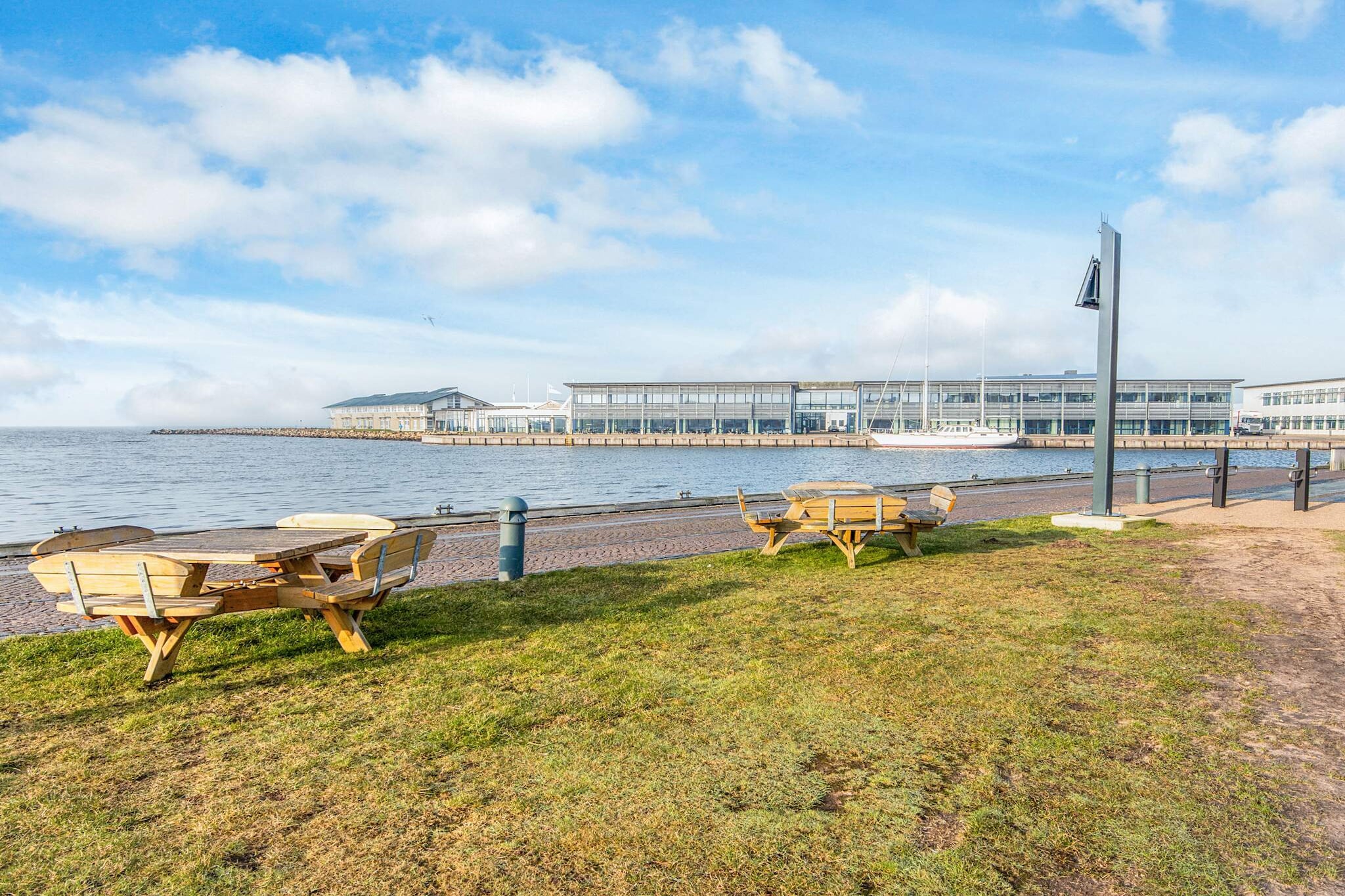 Charming Loft Apartment in Søndervig Located on the quaint Smedegade street, this cozy 27 m² studio apartment offers a comfortable space for two guests. The apartment features a double bed, a mini kitchen with an electric hob, fridge, and mini oven, making it perfect for short stays. The apartment has a simple and charming living area with a chest of drawers, a small table, and two chairs. You also have your own private entrance, adding to the convenience and privacy of the stay. Key Features: Living Room: Open-plan with a chest of drawers, small table, and two chairs. Bedroom: 1 comfortable double bed, ideal for two guests. Kitchen: Mini kitchen equipped with an electric hob, fridge, and mini oven for your basic cooking needs. Bathroom: Includes a washing machine, WC, sink, and shower for added comfort. Heating: District heating ensures a warm and cozy environment year-round. Outdoor Space: A shared courtyard area where you can sit and relax outdoors. Explore Søndervig and Beyond Søndervig, situated along the beautiful west coast of Jutland, offers a perfect blend of natural beauty and modern amenities. Just a stone's throw from the beach and dunes, you can enjoy walks along the North Sea or explore the scenic landscapes around Ringkøbing Fjord. Søndervig has been a popular holiday destination since the 1800s, thanks to its wide sandy beaches and vibrant atmosphere. Beyond the beach, Søndervig offers shopping, restaurants, and various activities for both families and adults. For the adventurous, there are numerous attractions nearby, such as Legoland, the Jutland Park Zoo, and the Hjerl Hede Open Air Museum. Whether you're looking to relax or explore, Søndervig is the perfect base for your holiday along the North Sea.A refundable deposit might be charged closer to your check-in date. The security deposit ensures a smooth stay and covers any additional services or consumption charges.This deposit covers utilities consumed during your stay and any additional services that may be taken.The final amount will be adjusted based on actual meter readings, actual usage of extra services, and any remaining balance will be refunded within 21 days after checkout.This deposit simply acts as a prepayment for charges that  you would anyways pay for, ensuring a seamless stay and check-out experience.