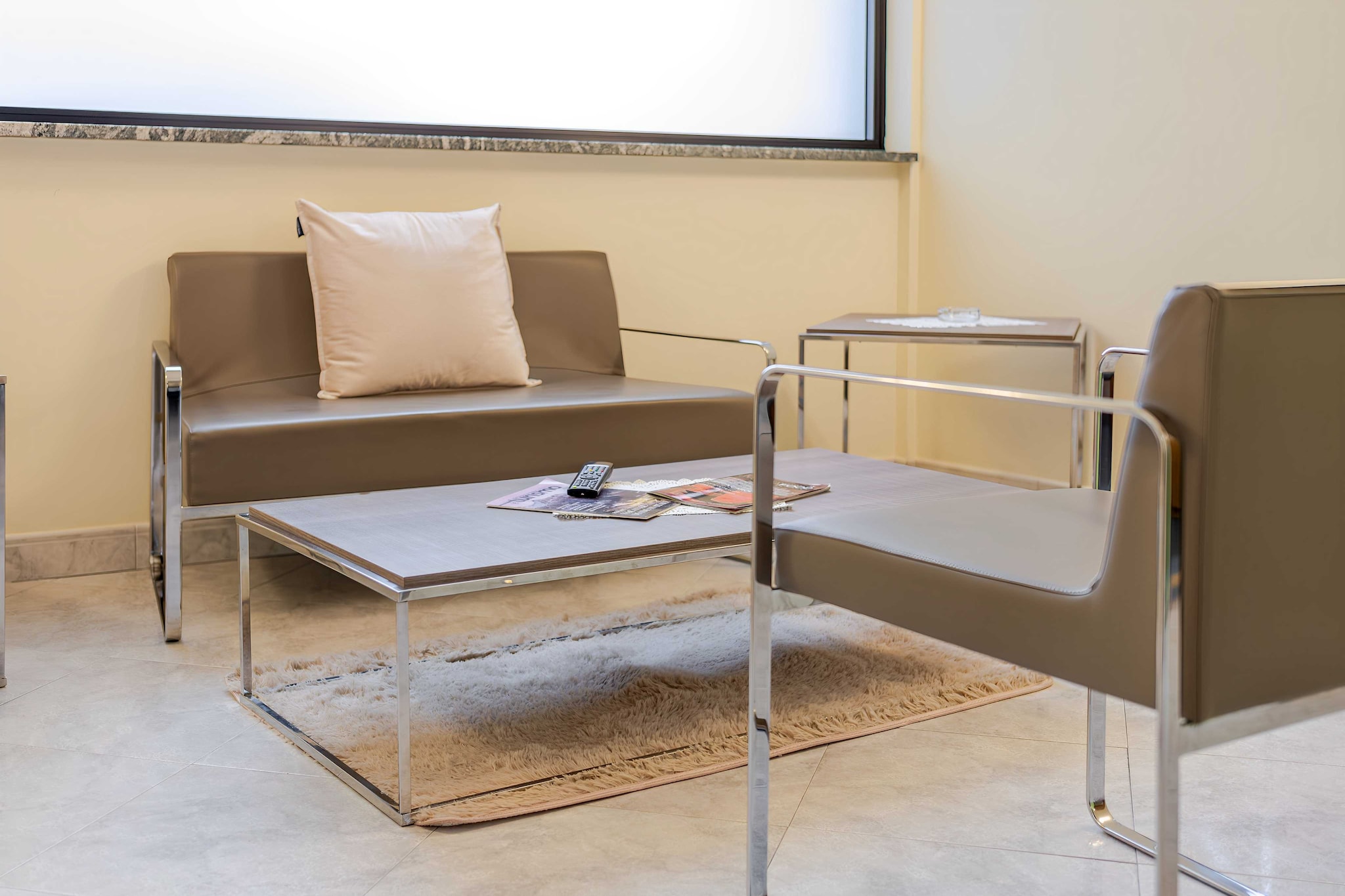 On the 2nd floor: (Living/bed room(Bed Linen, single bed, double bed, TV, air conditioning), bathroom(shower, toilet, shampoo))\n\nDesk, Elevator, Hot Water, Internet Access DSL, Safe, Wardrobe, First Aid, Beach, Play area, Breakfast room, electric kettle, coffee machine, microwave, fridge, balcony or terrace, heating, Essentials, Dedicated workspace, Cleaning Disinfection, Downtown, Enhanced cleaning practices, Near Ocean, Room-darkening shades, Town