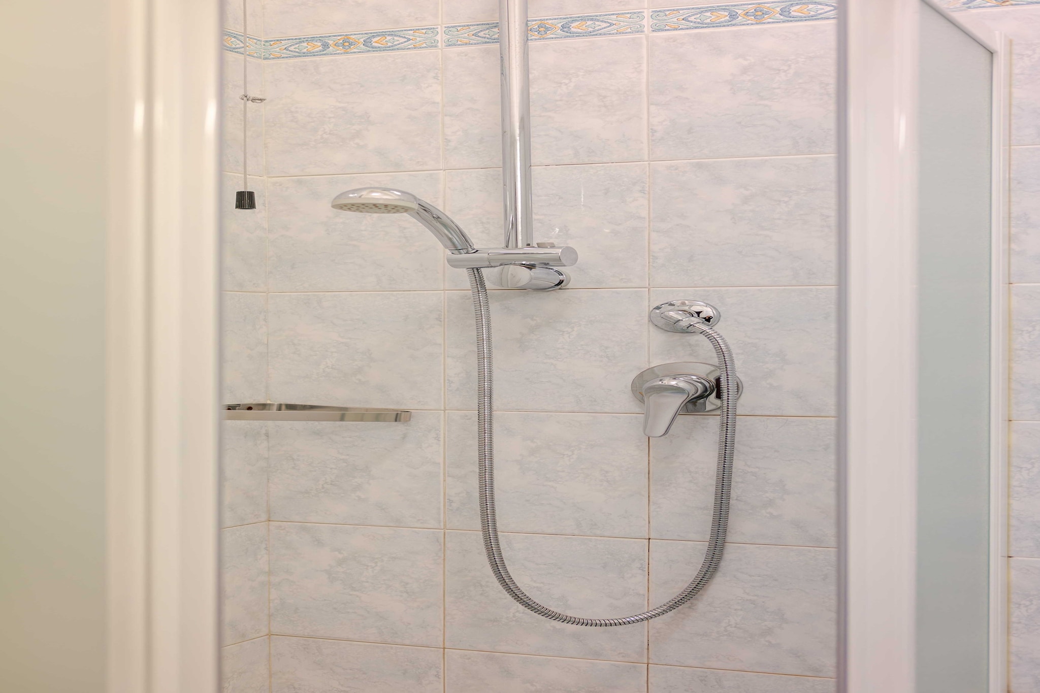 On the 1st floor: (Living/bed room(Bed Linen, TV, air conditioning, Queen Bed), bathroom(shower, toilet, shampoo))\n\nDesk, Elevator, Hot Water, Internet Access DSL, Safe, Wardrobe, First Aid, Beach, Play area, Breakfast room, electric kettle, coffee machine, microwave, fridge, balcony or terrace, heating, Essentials, Dedicated workspace, Cleaning Disinfection, Downtown, Enhanced cleaning practices, Near Ocean, Room-darkening shades, Town