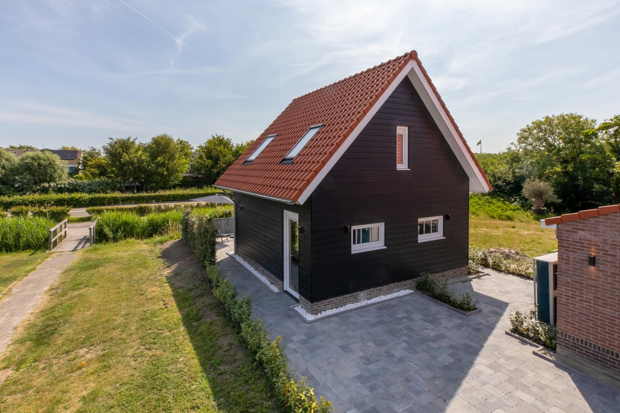 Huisje huren in Zeeland  De Strandloper Westkapelle - Charley Tooropstraat 1a  Strand & Natuur-Buitenkant zomer