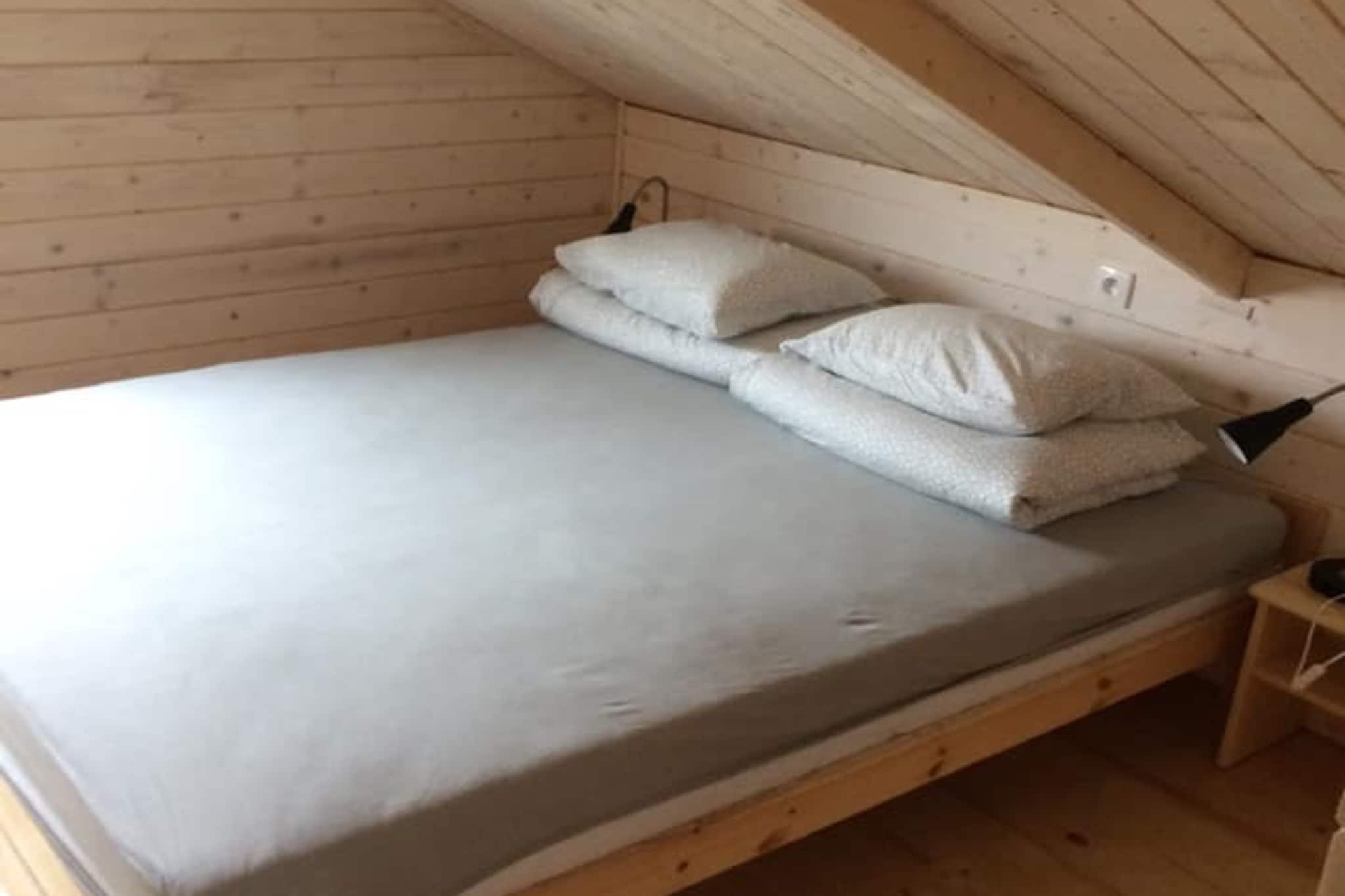 Domki wakacyjne dla 9 osób Mielenko-Slaapkamer