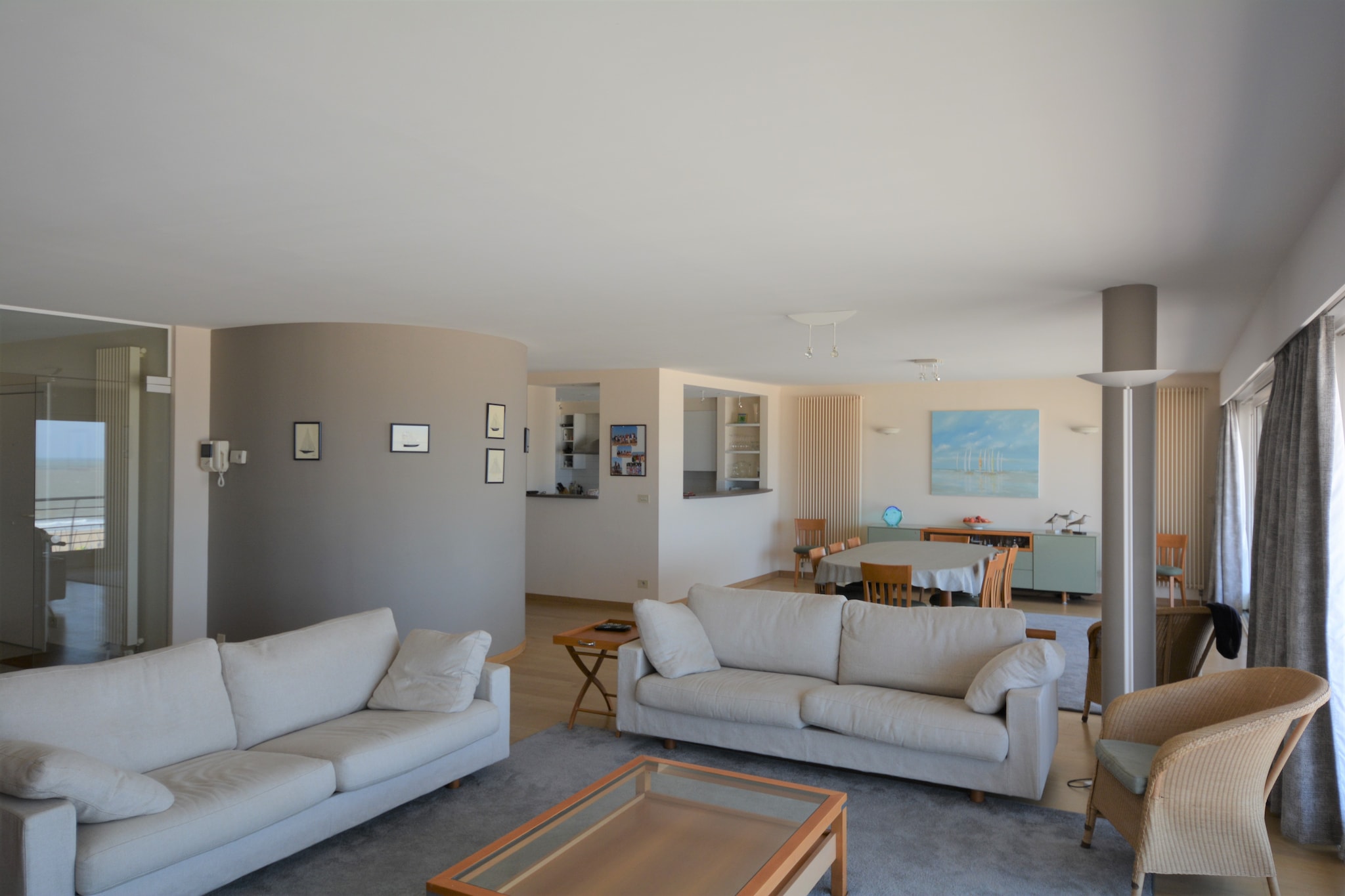 On the 7th floor: (Living room(TV, dining table, seating area), open kitchen(electric kettle, toaster, hood, coffee machine, oven, microwave, dishwasher, fridge-freezer), bedroom(double bed), bedroom(double bed), Bedroom with bathroom(double bed, bath tub, washbasin), Bedroom with bathroom(double bed, shower, washbasin, toilet), Bedroom with bathroom(single bed, single bed, washbasin), bathroom(bath tub, washbasin, washbasin, toilet), toilet(toilet))\n\ngarage, tumble dryer, washing machine, terrace, bicycle storage, ironing board, iron