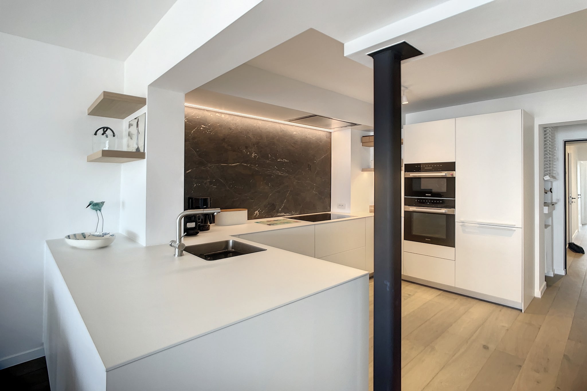 Discover this completely renovated three-bedroom apartment located on the seafront, offering fantastic views from the fourth floor. This charming gem is perfect for families or small groups looking to enjoy a beach getaway while providing modern comforts. The spacious living room features digital TV for your entertainment, and the apartment is filled with natural light, emphasizing its airy ambiance.

The well-equipped kitchen is designed with convenience in mind, featuring a dishwasher, fridge, and freezer for all your culinary needs. Step outside onto one of the two terraces to enjoy the fresh sea air and stunning views, perfect for morning coffee or evening relaxation. The three bedrooms include two with cozy double beds and a third bedroom with a bunk bed designed for two guests, accommodating up to eight occupants. Bathrooms with showers provide added comfort and convenience throughout your stay. 

For your convenience, amenities such as a washing machine, bicycle storage, and a lift make it easy to enjoy everything this apartment has to offer. Additional features include complimentary WiFi, a strict no smoking policy, and no pets allowed, ensuring a peaceful environment. This lovely apartment is truly a haven for anyone seeking a relaxing seafront escape.