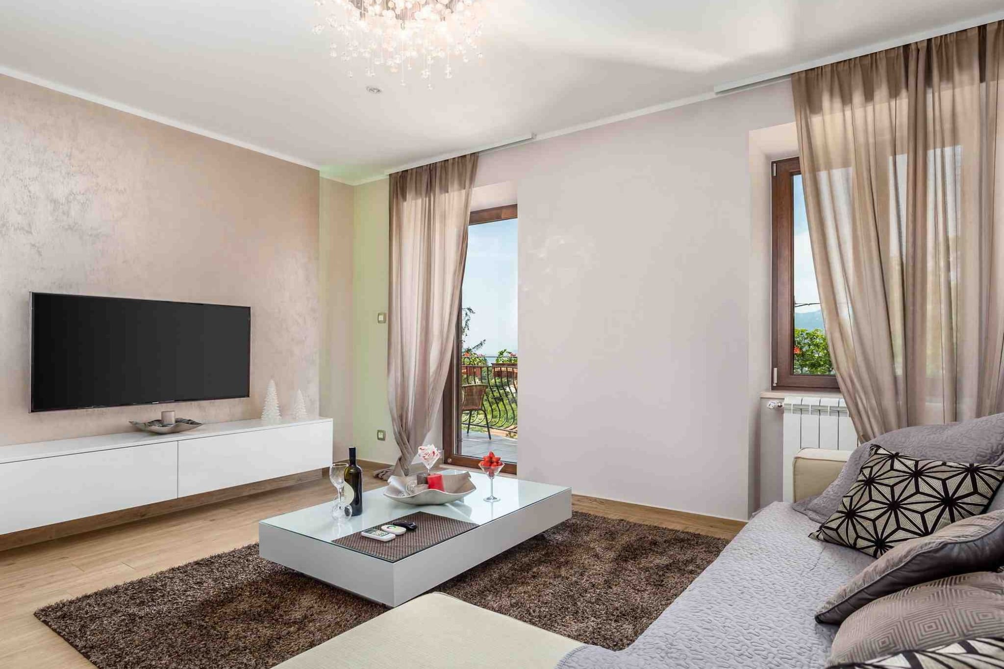 Modern Comfort with Shared Pool, Balconies & Lush Green Surroundings - One Bedroom Apartment (Romantic)-Living room