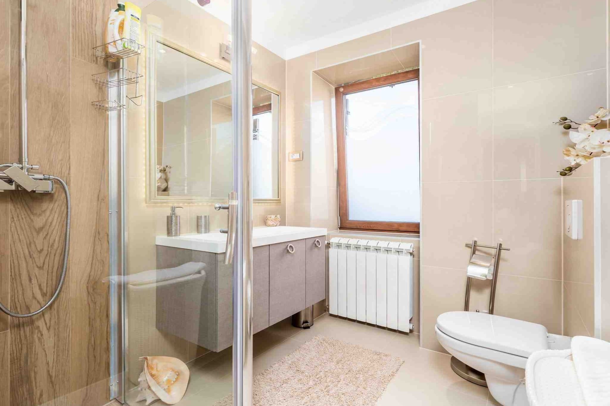 Modern Comfort with Shared Pool, Balconies & Lush Green Surroundings - One Bedroom Apartment (Romantic)-Bathroom