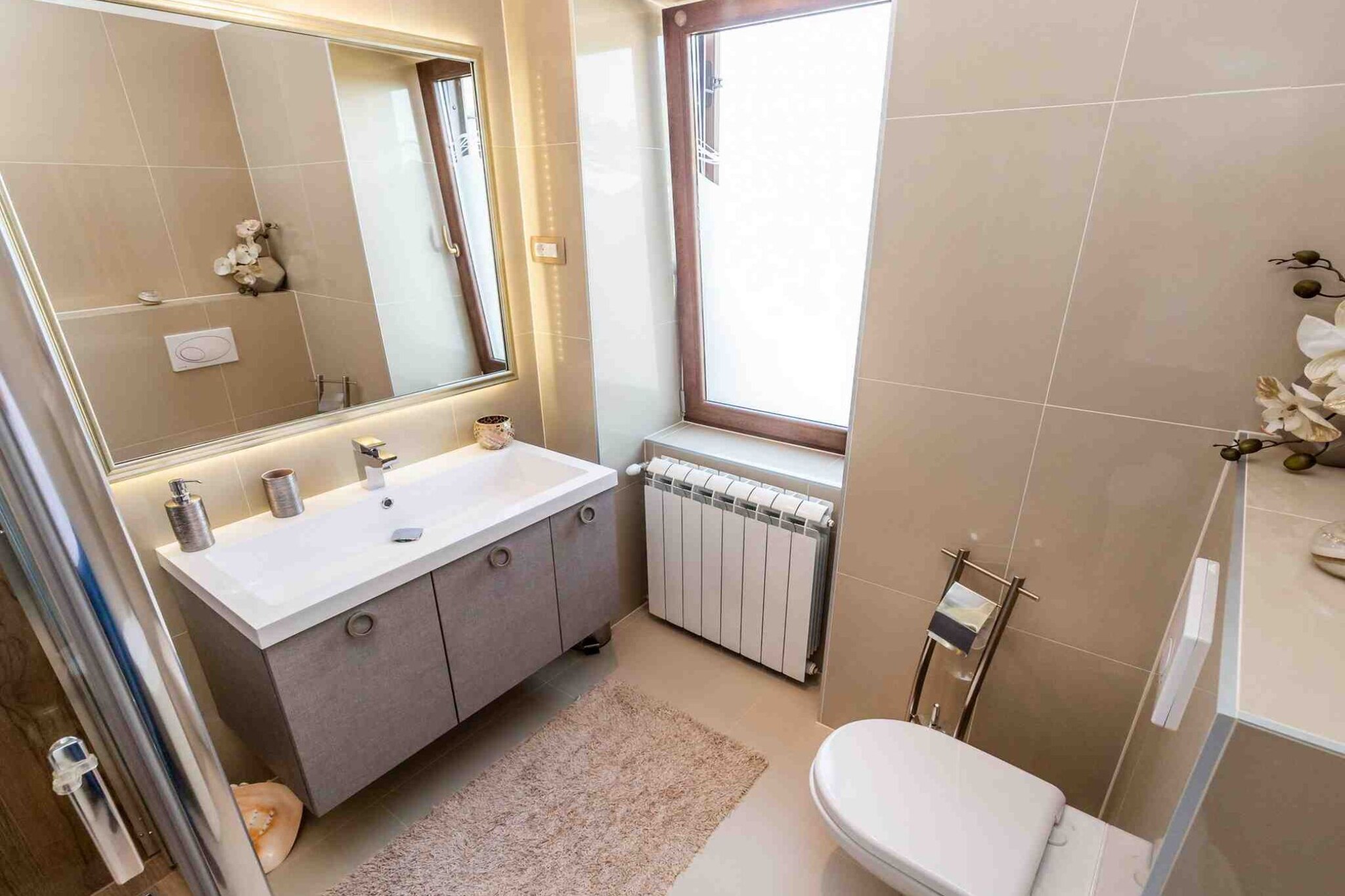 Modern Comfort with Shared Pool, Balconies & Lush Green Surroundings - One Bedroom Apartment (Romantic)-Bathroom