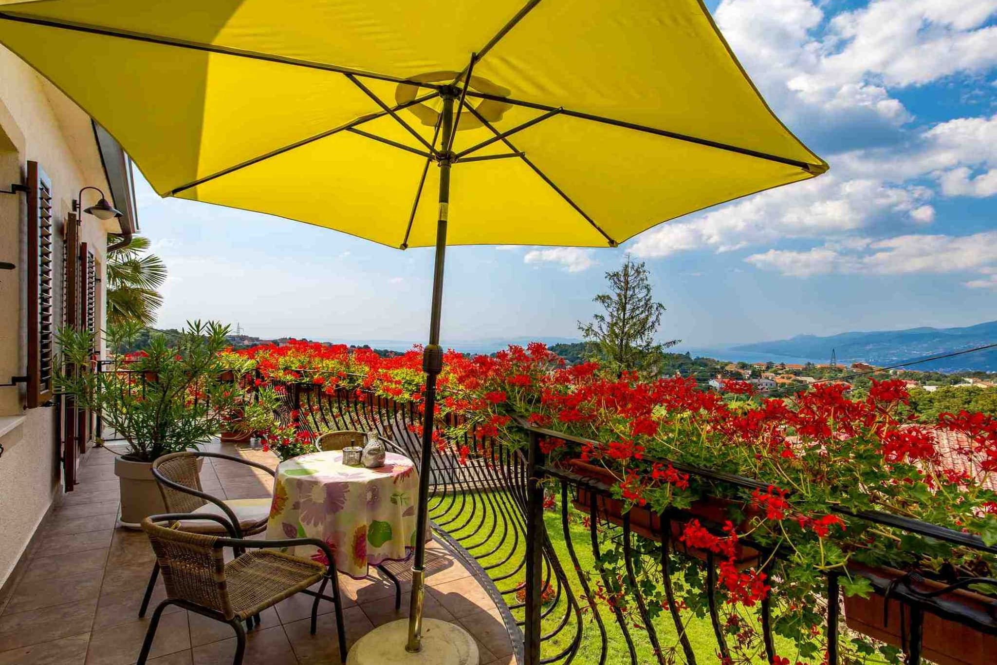 Modern Comfort with Shared Pool, Balconies & Lush Green Surroundings - One Bedroom Apartment (Romantic)-Terrace balcony