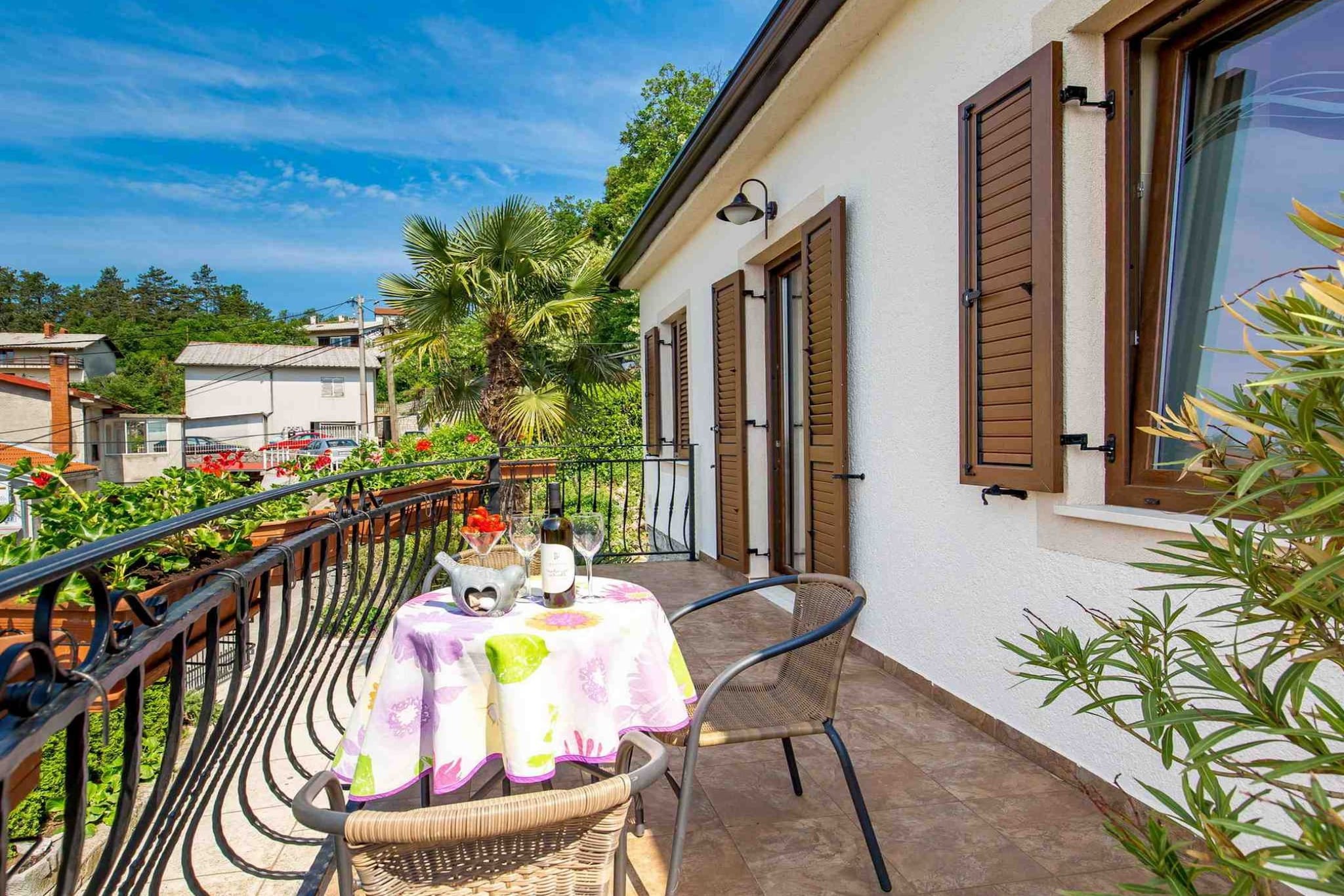 Modern Comfort with Shared Pool, Balconies & Lush Green Surroundings - One Bedroom Apartment (Romantic)-Terrace balcony