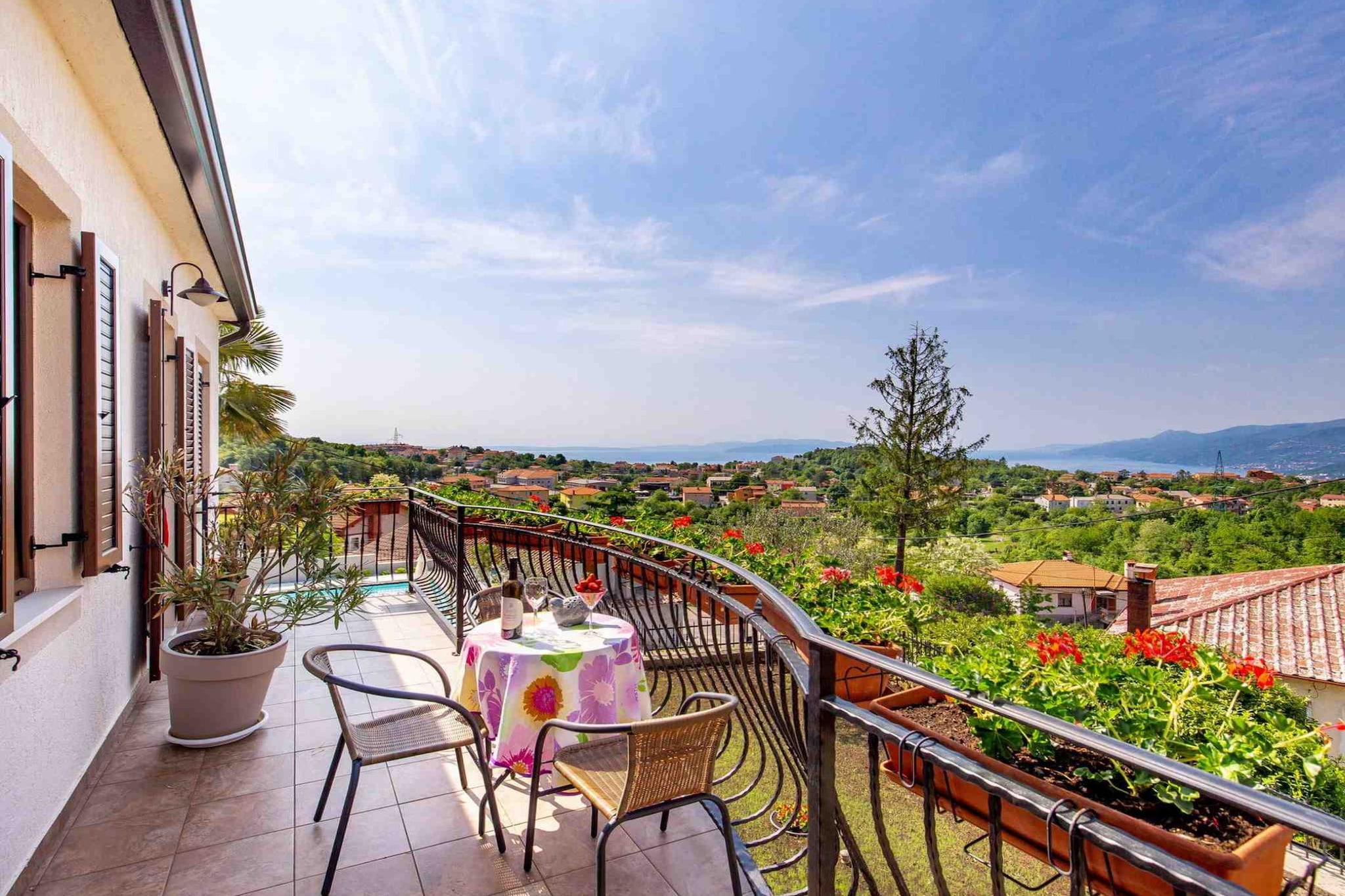 Modern Comfort with Shared Pool, Balconies & Lush Green Surroundings - One Bedroom Apartment (Romantic)-Terrace balcony