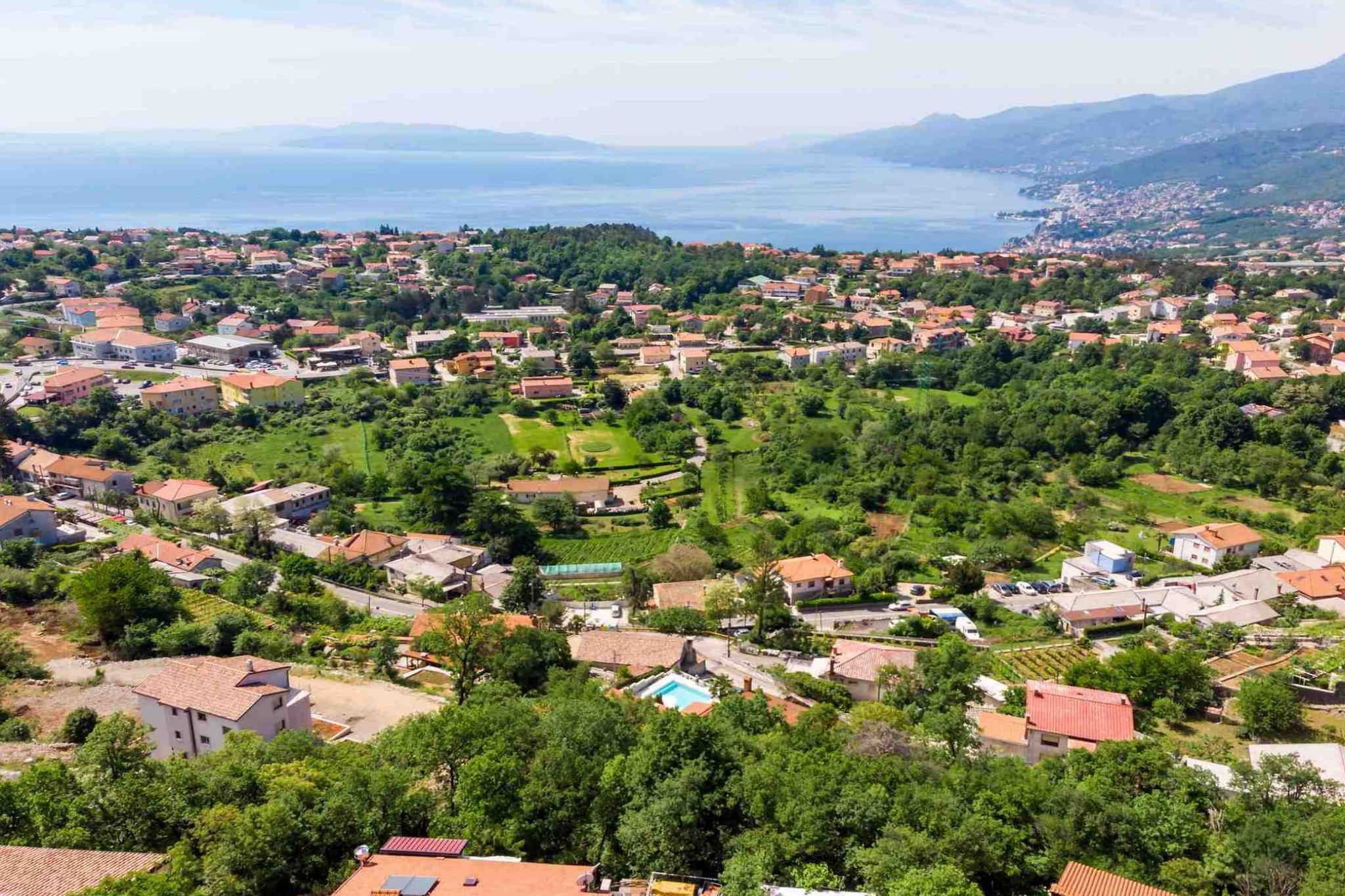 Modern Comfort with Shared Pool, Balconies & Lush Green Surroundings - One Bedroom Apartment (Romantic)-View