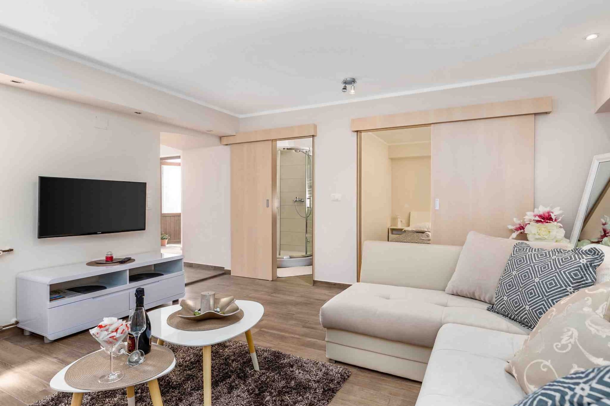 Modern Comfort with Shared Pool, Balconies & Lush Green Surroundings - One Bedroom Apartment (Relax)-Living room