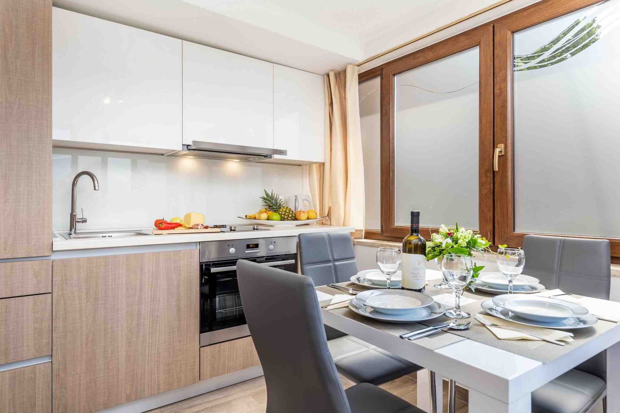 Modern Comfort with Shared Pool, Balconies & Lush Green Surroundings - One Bedroom Apartment (Relax)-Kitchen
