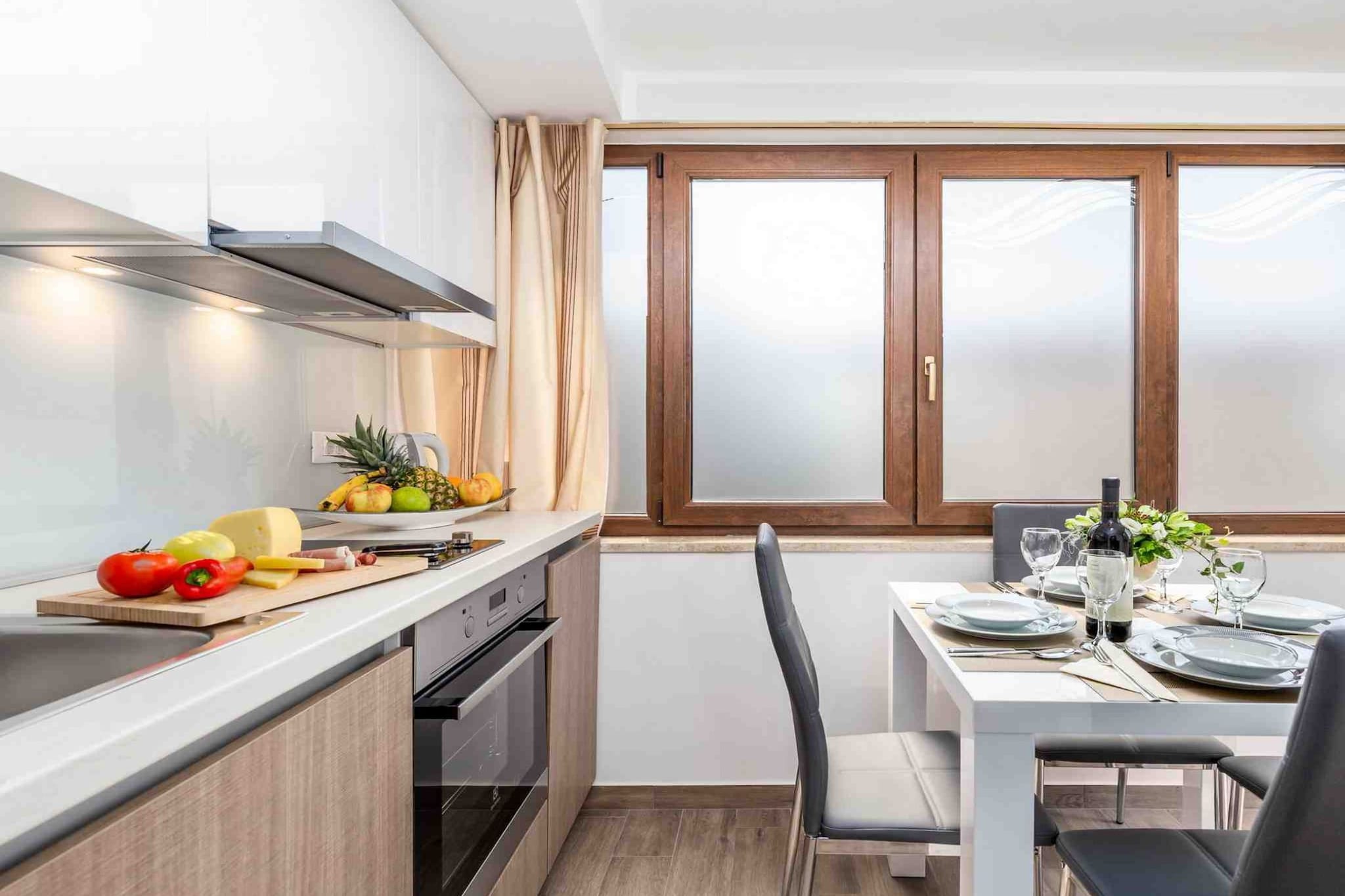 Modern Comfort with Shared Pool, Balconies & Lush Green Surroundings - One Bedroom Apartment (Relax)-Kitchen