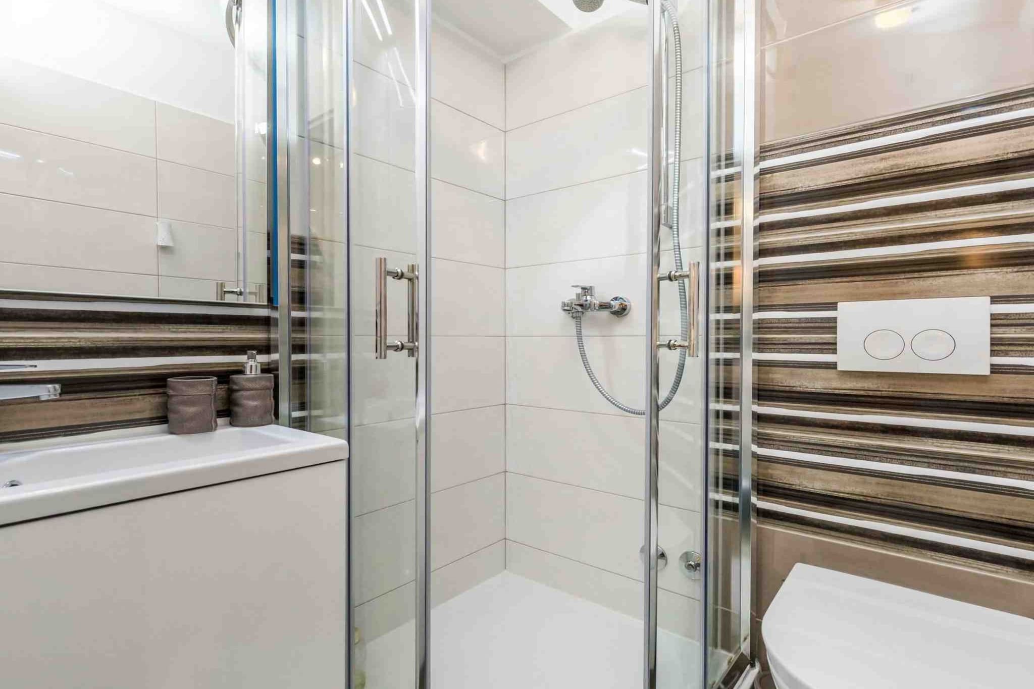 Modern Comfort with Shared Pool, Balconies & Lush Green Surroundings - One Bedroom Apartment (Relax)-Bathroom