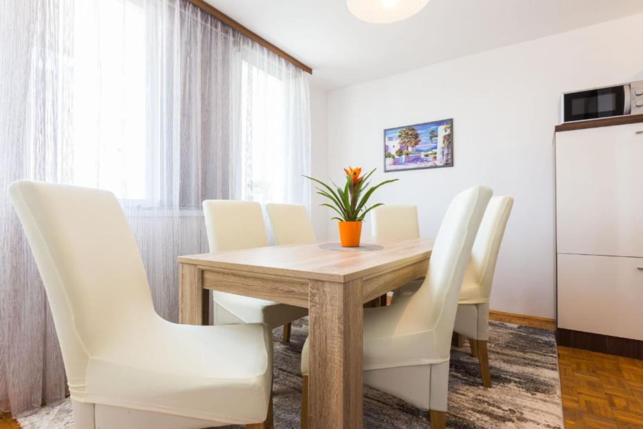 Stylish Two Bedroom Apartment Retreat with Balcony in Zadar Two Bedrooms-Dining room