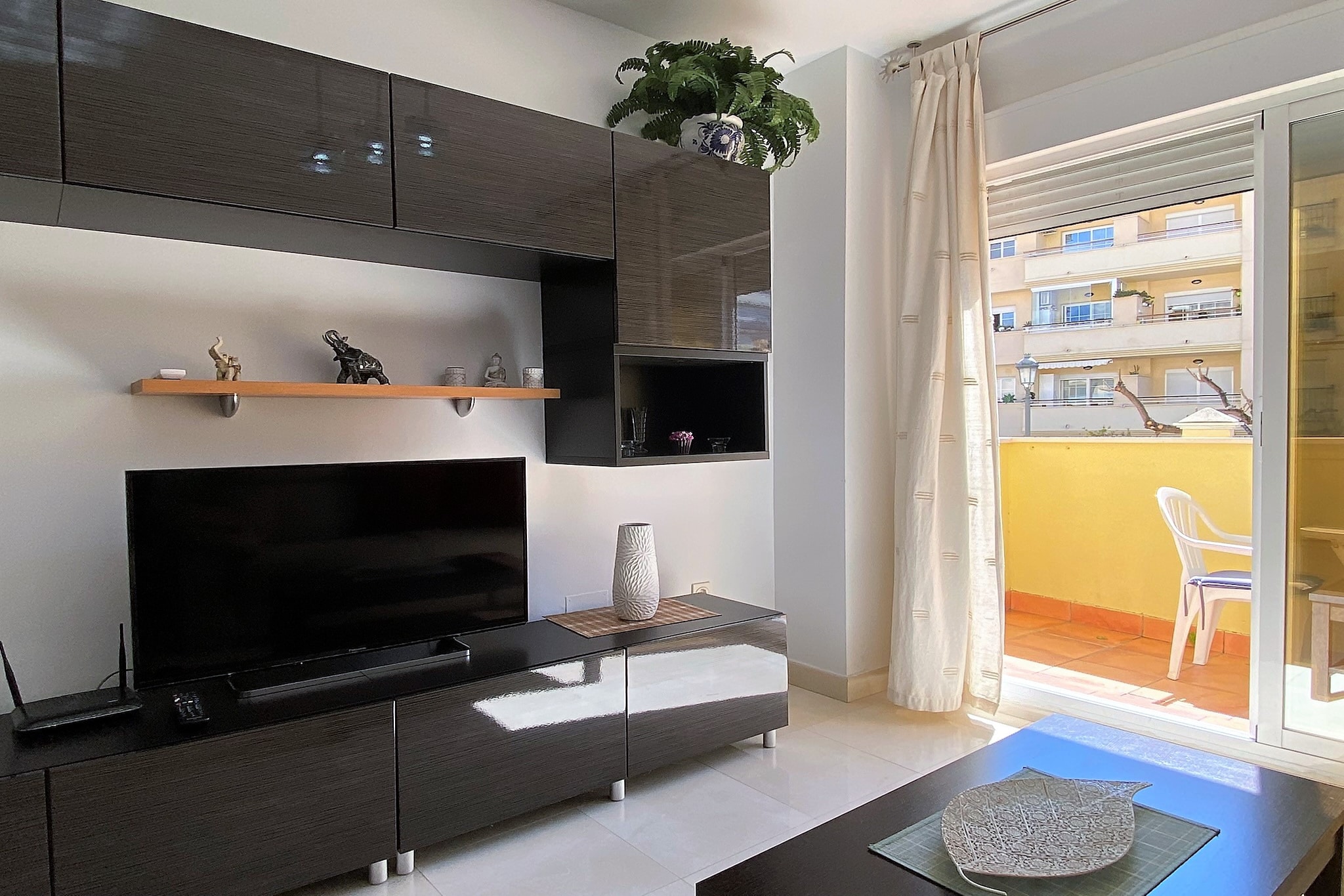 Triton Urban Apartment by Casasol-Living room