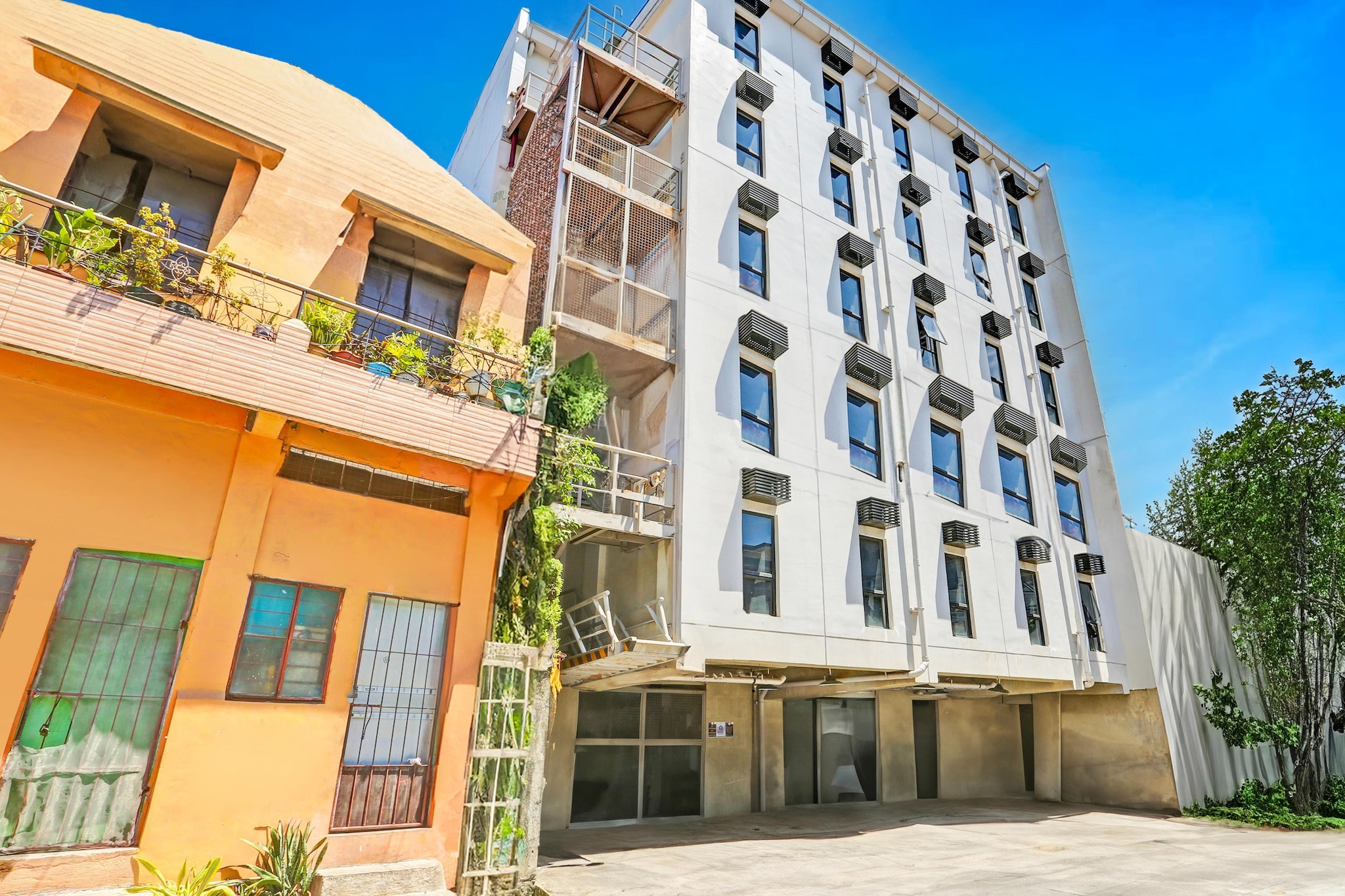 Experience comfort, style, and convenience at Spacious Quad Comfort Stay at Mytown Madrid, Mytown Madrid, ideally located in the lively heart of Makati City. Designed with solo female travelers in mind, our stylish female bunk accommodations offer air-conditioned beds, work desks, and access to shared bathrooms. Each bunk is thoughtfully equipped with a mini-bar, microwave, shower, and toaster, ensuring a flexible and comfortable stay.

Enjoy a range of essential facilities, including free WiFi throughout the property, an outdoor fireplace for cozy evenings, a convenient elevator, and a 24-hour front desk to assist with any requests. For guests traveling with vehicles, paid on-site parking is available.

The property is strategically located just 6 km from Ninoy Aquino International Airport and only 1.2 km from the bustling Bonifacio High Street. Youâ€™ll have easy access to top shopping and dining destinations like Glorietta Mall, Power Plant Mall, and Greenbelt Mall.