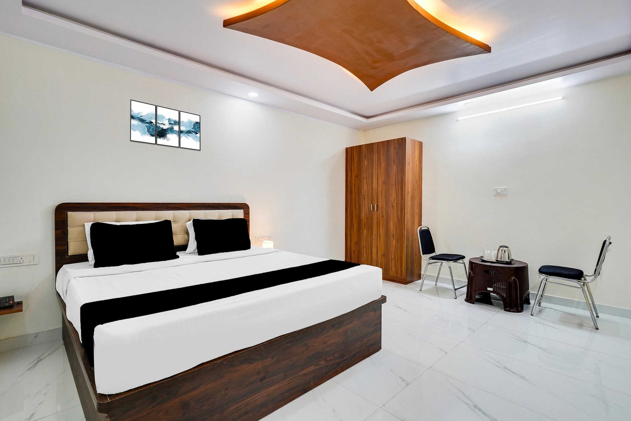 Comfortable Accommodation: Cosy Stays at Bidadi by Royal Garuda in Bidadi offers family rooms with air-conditioning, private bathrooms, work desks, and seating areas. Each room includes free toiletries, bath or shower, TV, tiled floors, and a wardrobe.

Essential Facilities: Guests enjoy free WiFi throughout the property, a 24-hour front desk, housekeeping service, room service, and luggage storage. Additional amenities include a workout area and a swimming pool.

Convenient Location: Located 65 km from Kempegowda International Airport, the hotel is near attractions such as Wonderla (5 km), ISKCON Hare Krishna Temple (25 km), and Cubbon Park (30 km).

Unmarried couples are warmly welcome at this property.
Guests with local ID proof are warmly welcome.

Early Check-In Policy: A full dayâ€™s room rate will be charged for check-ins before 6:00 AM. Complimentary early check-in is available between 6:00 AM and 10:00 AM, subject to room availability.
Check-in is only available to guests aged 18 and above. Please provide a government-issued ID to confirmÂ yourÂ age.
