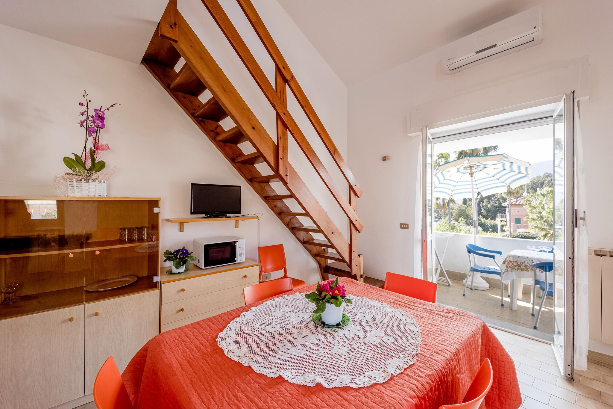 Ground floor: (open kitchen(dining table, cooker, microwave, fridge-freezer), Living/bed room(double sofa bed, TV, seating area))\n\nmezzanine: (bedroom(double bed), bathroom(bathtub with shower, washbasin, toilet))\n\nbalcony or terrace, heating, air conditioning, garden furniture, parking, swimming pool(shared with other guests,  5 x  4 m., opened from Apr upto and including Sep), Laundry Package for a fee