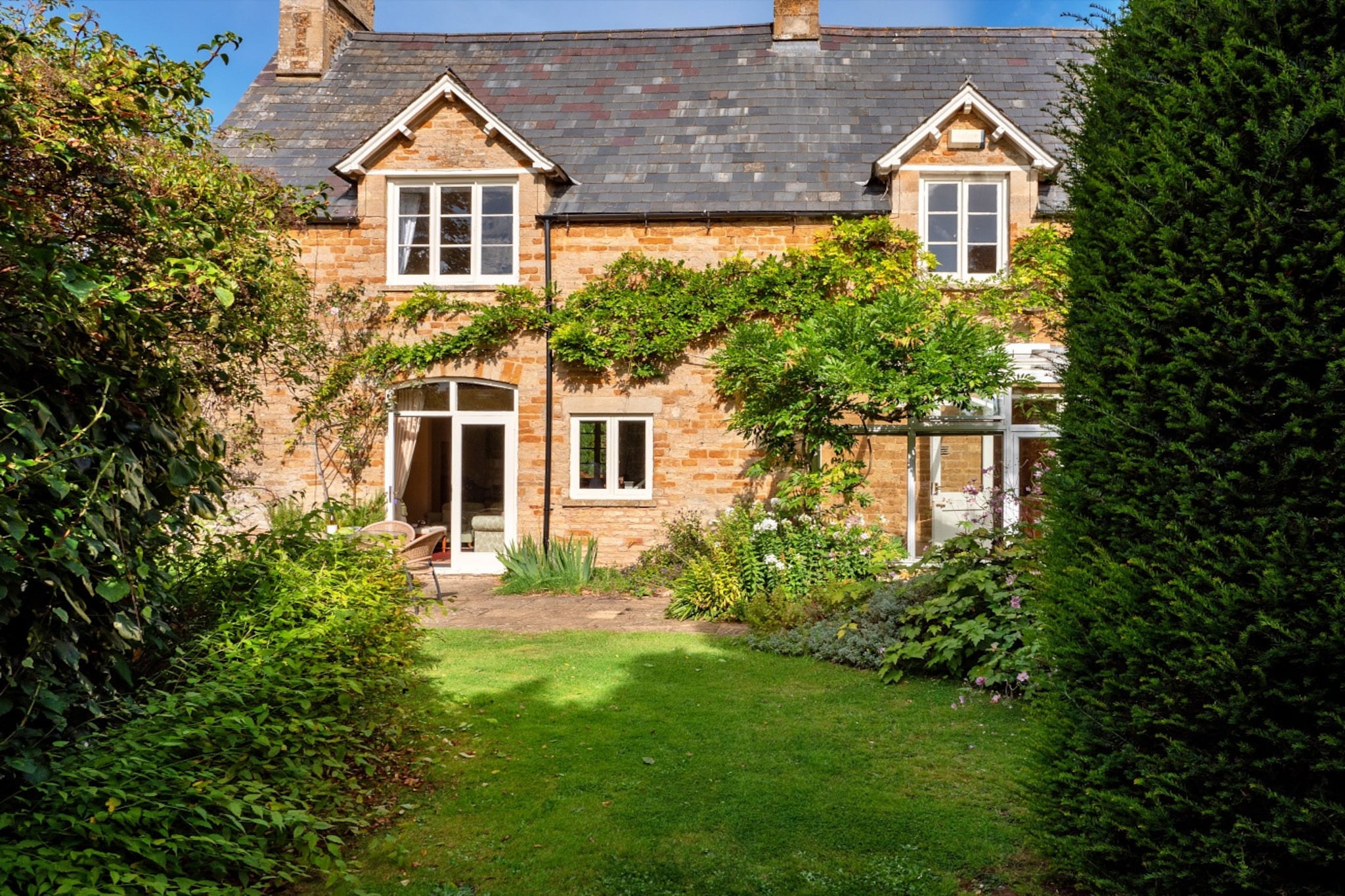 Lodge Cottage-Tuinen zomer