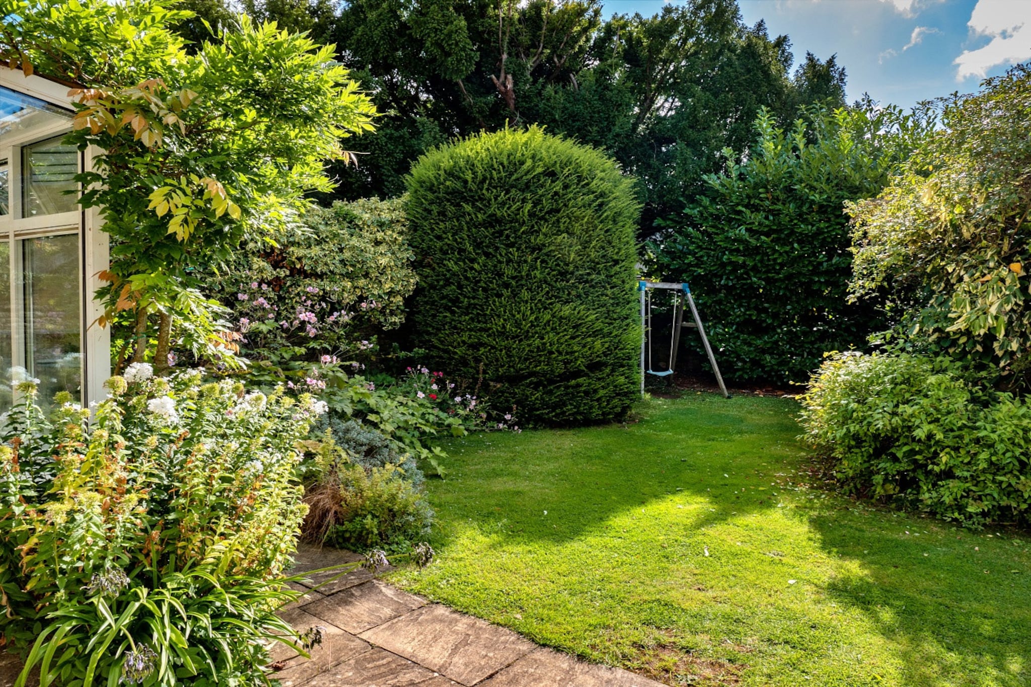 Lodge Cottage-Tuinen zomer
