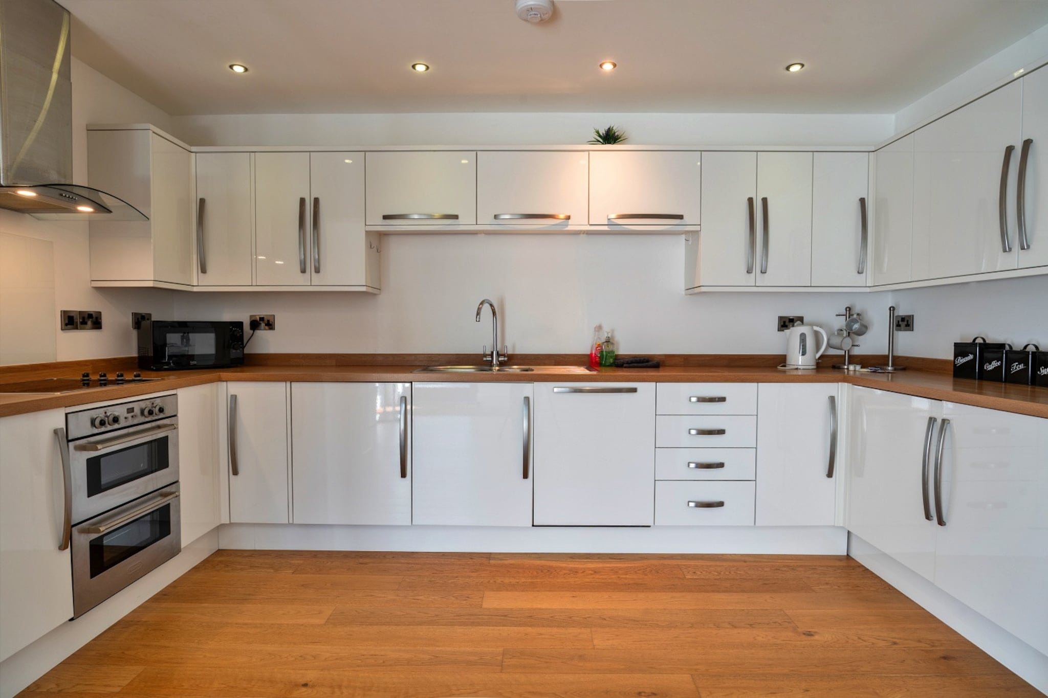 Ground floor: (open kitchen(electric kettle, oven, microwave, dishwasher, fridge-freezer, dishes and cutlery), Living/diningroom(TV, dining table, seating area), bedroom(single bed, single bed), bedroom(double bed), bedroom(double bed), bathroom(shower), bathroom(shower), bathroom(bath tub), Internet access)\n\nGarden Furniture , tumble dryer, washing machine, garden, parking, air to air heatpump