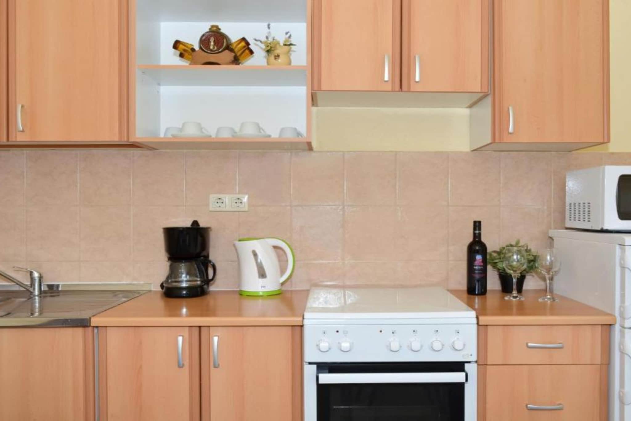 Apartments Nina - Two Bedroom Apartment with Balcony A1-Kitchen
