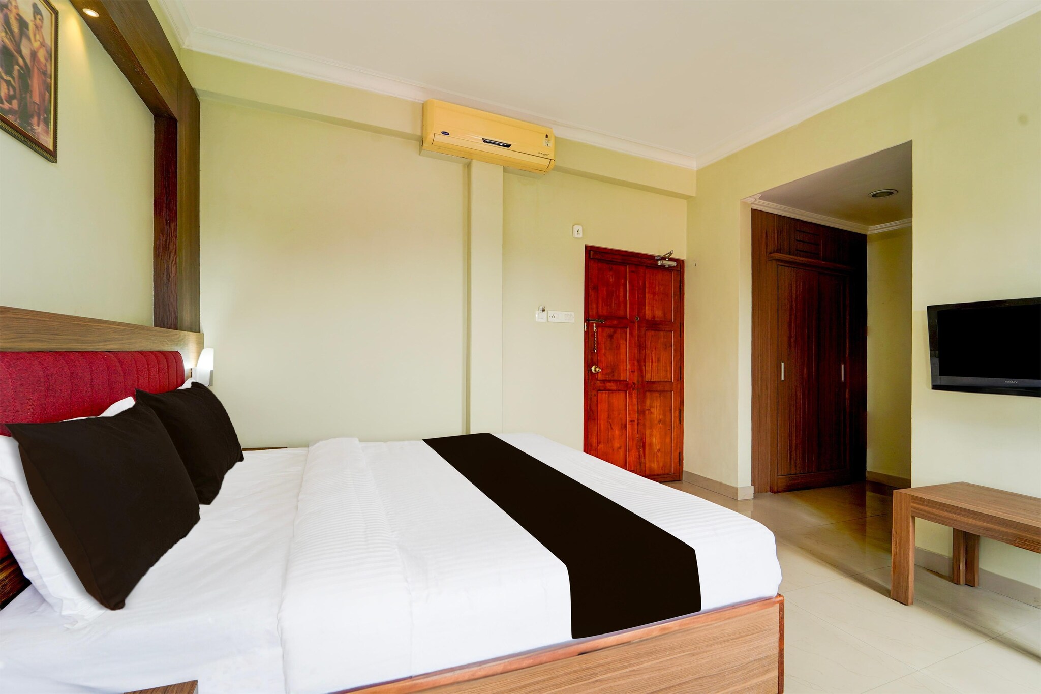 Super Townhouse MG Road Trivandrum