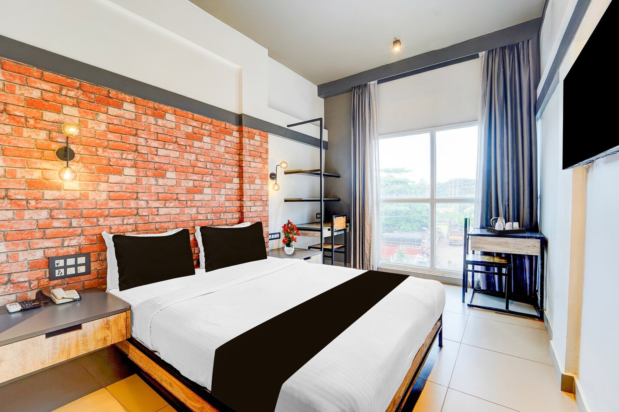 Comfortable Accommodations: Super Townhouse Oak Mangalore Central in Mangalore offers family rooms with air-conditioning, private bathrooms, work desks, and seating areas. Each room includes free toiletries, a bath or shower, TV, and tiled floors. Essential Facilities: Guests enjoy free WiFi throughout the property, a elevator, 24-hour front desk, housekeeping service, room service, and luggage storage. Additional amenities include a workout area and a swimming pool. Prime Location: Located 6.8 mi from Mangalore International Airport, the hotel is a 4-minute walk from Gokarnanatheshwara Temple. Nearby attractions include Mangalore Central Station (1.2 mi), Kadri Manjunath Temple and Mangala Devi Temple (2.5 mi each).

Unmarried couples are warmly welcome at this property.
Guests with local ID proof are warmly welcome.
Apologies, but we are currently unable to host foreign nationals at this property.
Early Check-In Policy: A full day’s room rate will be charged for check-ins before 6:00 AM. Complimentary early check-in is available between 6:00 AM and 10:00 AM, subject to room availability.
 
Check-in is only available to guests aged 18 and above. Please provide a government-issued ID to confirm your age.