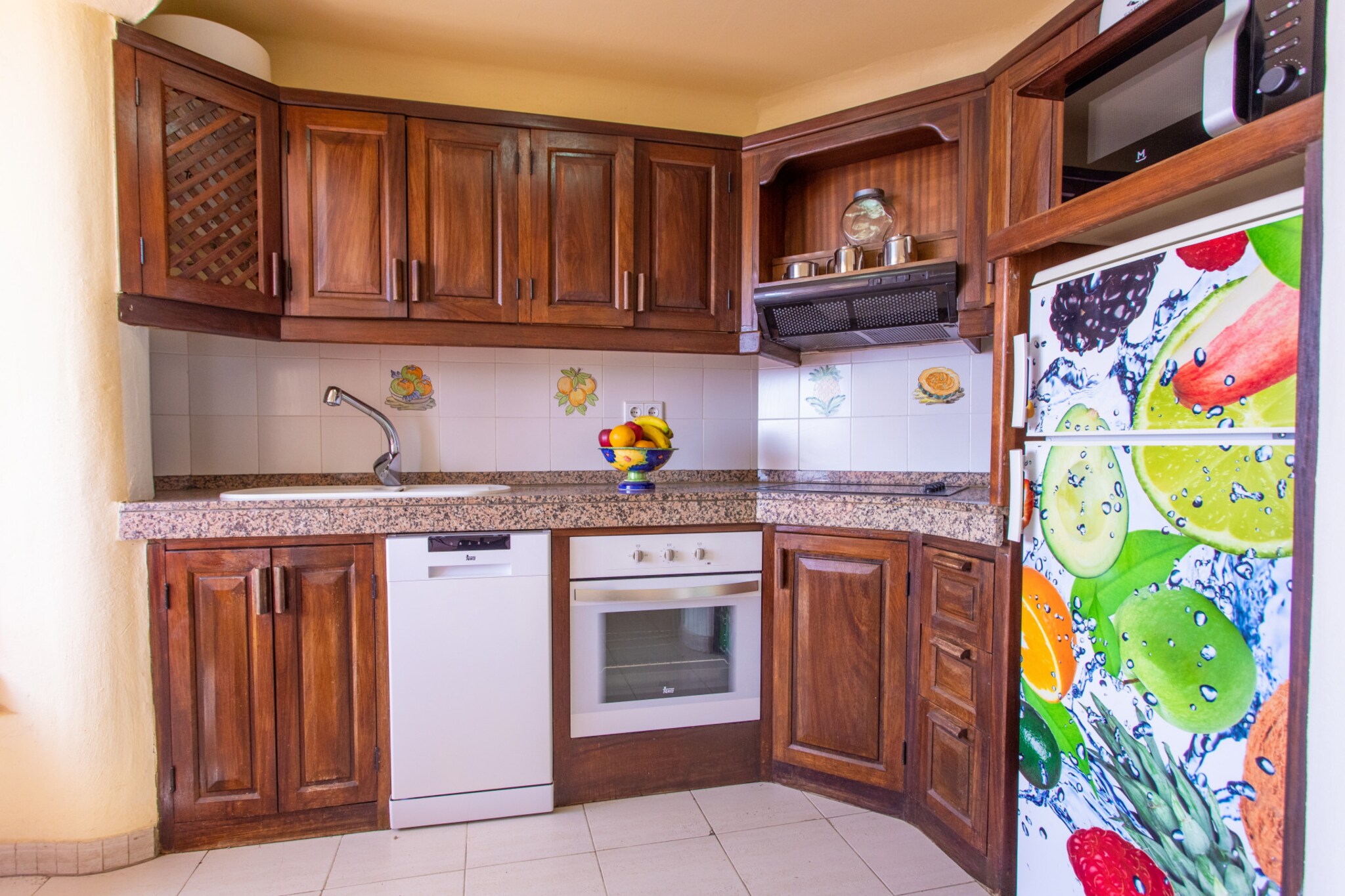 Enjoy a relaxing getaway in this bright and well-furnished apartment located in the tranquil coastal town of BahÃ­a Feliz. With two double bedrooms and a welcoming living space, this seaside retreat comfortably accommodates up to four guests. Step onto the private balcony to take in soothing sea views while enjoying your morning coffee or a quiet sunset. The property is part of a peaceful complex featuring a year-round heated swimming pool and lush gardens, making it an ideal spot to unwind by the ocean._x000D_
_x000D_
Situated just 5 metres from Playa del Ãguila and close to a rocky beach as well, this holiday home offers a prime beachfront location. Public transport is conveniently located 100 metres away, and youâ€™re just a short drive from a variety of attractions including Holidayworld Maspalomas (9 km), Aqualand Maspalomas (13 km), and the Maspalomas Golf Course (14 km). Nature lovers can take scenic drives to iconic spots like Roque Nublo (39 km), Pico de las Nieves (35 km), or the picturesque village of Tejeda (48 km)._x000D_
_x000D_
The apartment is fully equipped with everything you need for a comfortable stay, including a ceramic hob kitchen with fridge, oven, microwave, freezer, dishwasher, coffee maker, toaster, and juicer. Additional amenities include a washing machine, hairdryer, iron, Smart TV with radio, and unlimited Wi-Fi. Whether you're sunbathing, exploring the island, or simply enjoying a laid-back evening by the sea, this apartment offers the perfect base for your Gran Canaria holiday._x000D_
