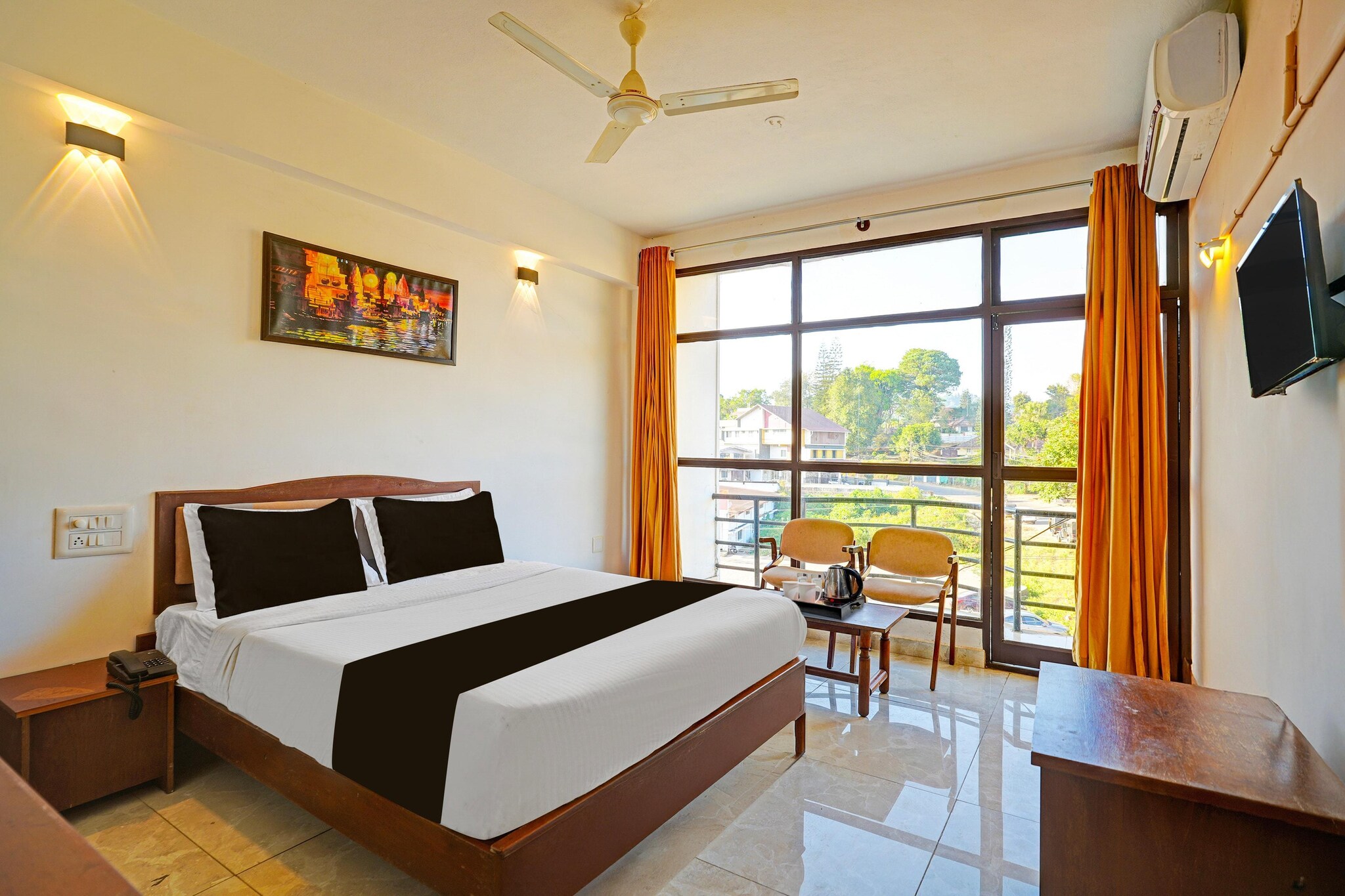 Comfortable Accommodations: Super Townhouse Madikeri Fort Formerly Hotel Raj in Madikeri offers family rooms with air-conditioning, private bathrooms, work desks, and seating areas. Each room includes free toiletries, bath or shower, TV, tiled floors, and wardrobes.
Essential Facilities: Guests enjoy free WiFi throughout the property, a 24-hour front desk, housekeeping service, room service, and luggage storage. Additional amenities include air-conditioning, private bathrooms, work desks, seating areas, free toiletries, bath or shower, TV, tiled floors, and wardrobes.
Prime Location: Located 87 km from Kannur International Airport, the hotel is near Raja Seat (2 km), Madikeri Fort (16-minute walk), and Abbi Falls (6 km). Reception staff speak English and Hindi.
Unmarried couples are warmly welcome at this property.
Guests with local ID proof are warmly welcome.
Early Check-In Policy: A full day’s room rate will be charged for check-ins before 6:00 AM. Complimentary early check-in is available between 6:00 AM and 10:00 AM, subject to room availability.
Check-in is only available to guests aged 18 and above. Please provide a government-issued ID to confirm your age.