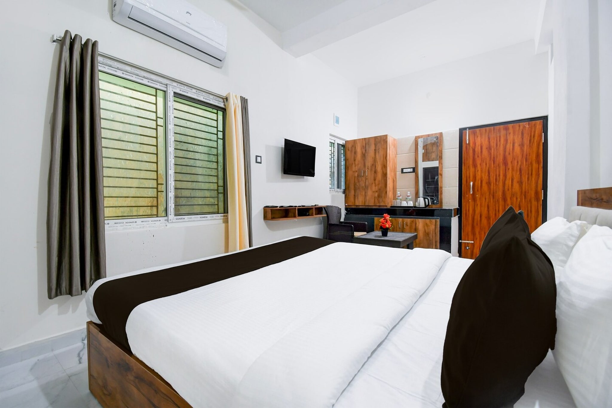 Comfortable Accommodations: Rooms feature air-conditioning, TV, and free WiFi throughout the property. Family rooms and amenities such as a lounge, elevator, and shared kitchen enhance guest comfort. 

Dining and Leisure: A family-friendly restaurant serves Indian cuisine for lunch and dinner. The bar provides a relaxing space for guests to unwind.

Unmarried couples are warmly welcome at this property.
Guests with local ID proof are warmly welcome.
Early Check-In Policy: A full day’s room rate will be charged for check-ins before 6:00 AM. Complimentary early check-in is available between 6:00 AM and 10:00 AM, subject to room availability.
Check-in is only available to guests aged 18 and above. Please provide a government-issued ID to confirm your age.