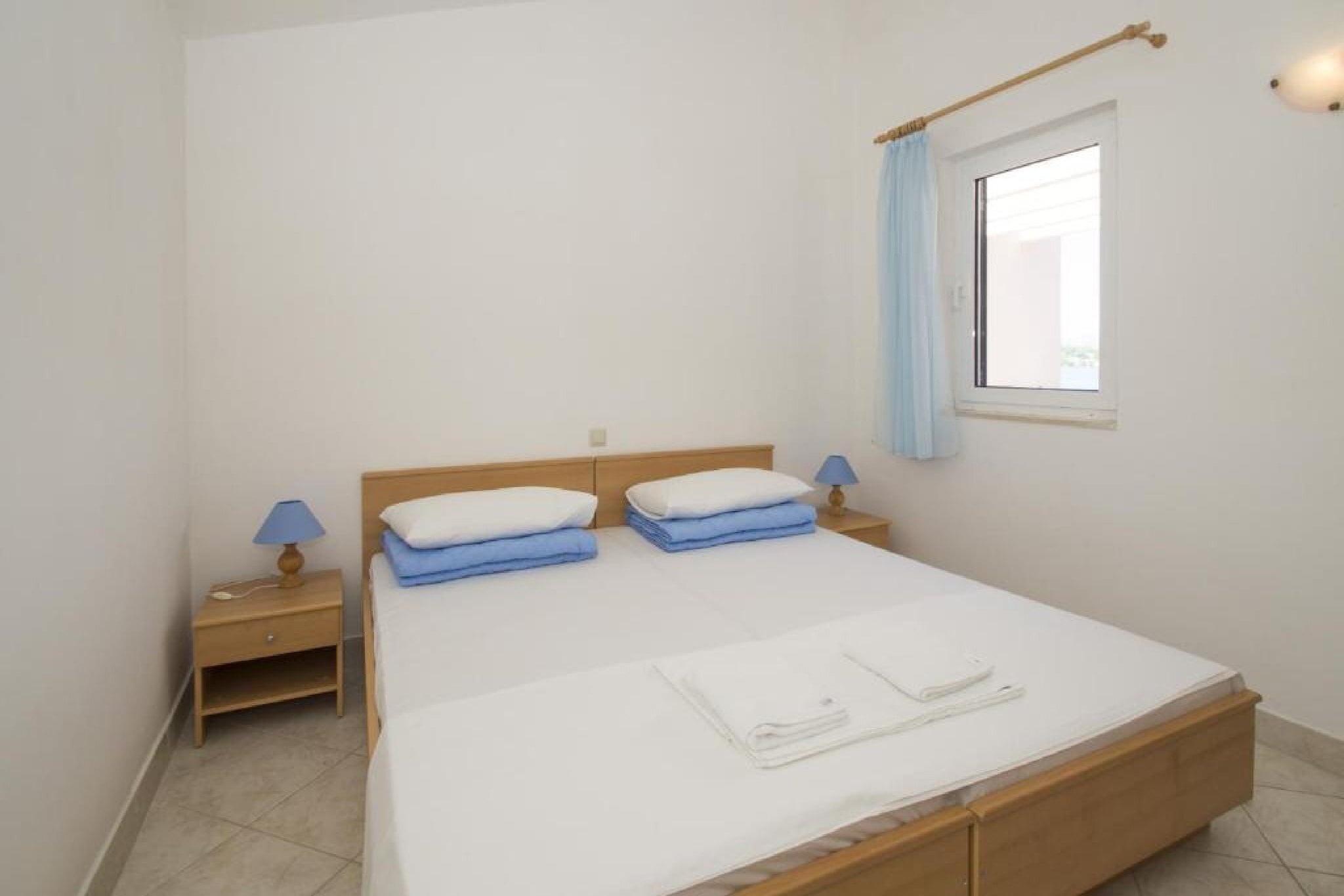 Lumbarda Resort Apartments - Standard One-Bedroom Apartment E7-Schlafzimmer