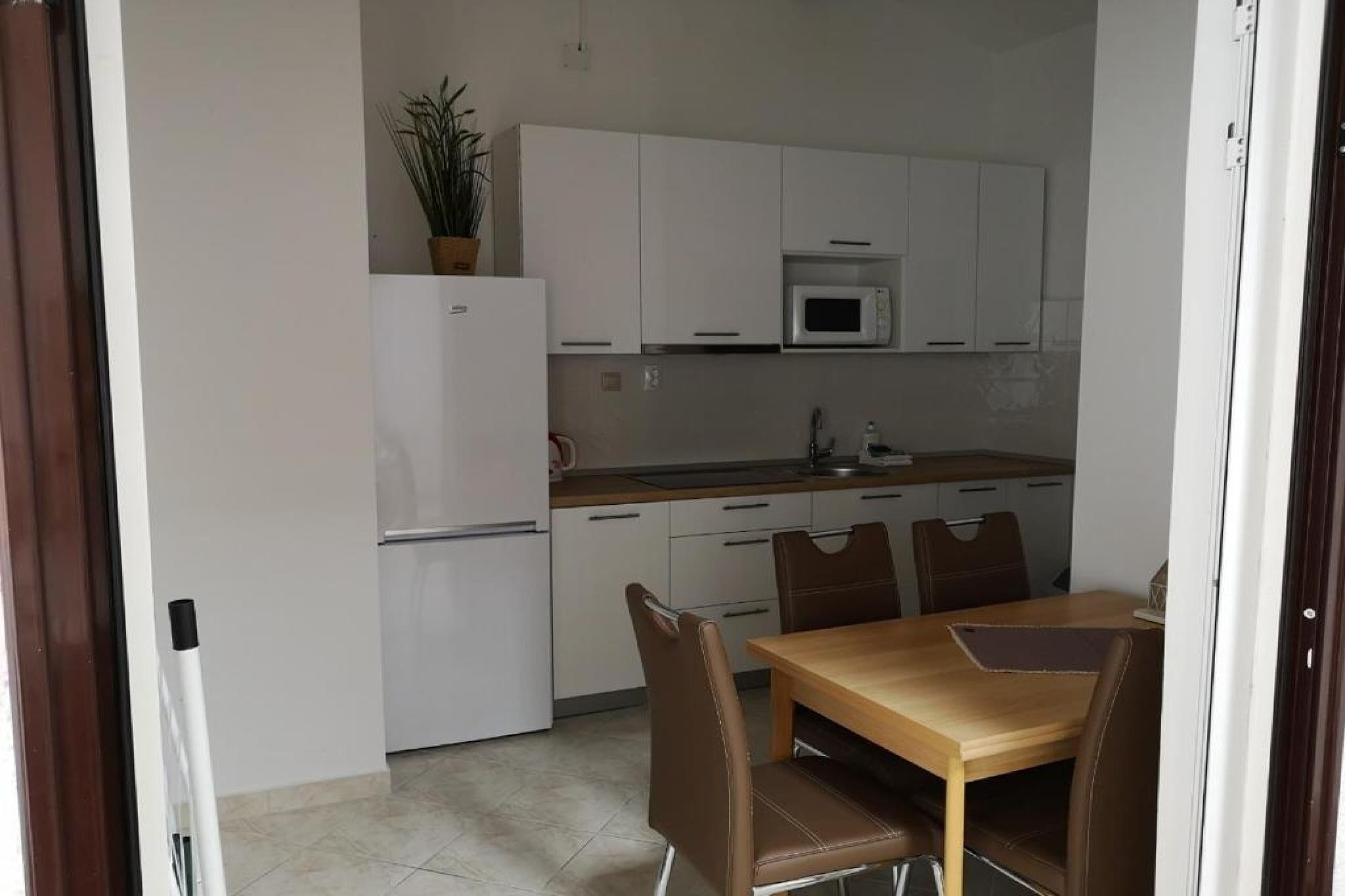 Lumbarda Resort Apartments -Comfort Two-Bedroom Apartment F7-Esszimmer