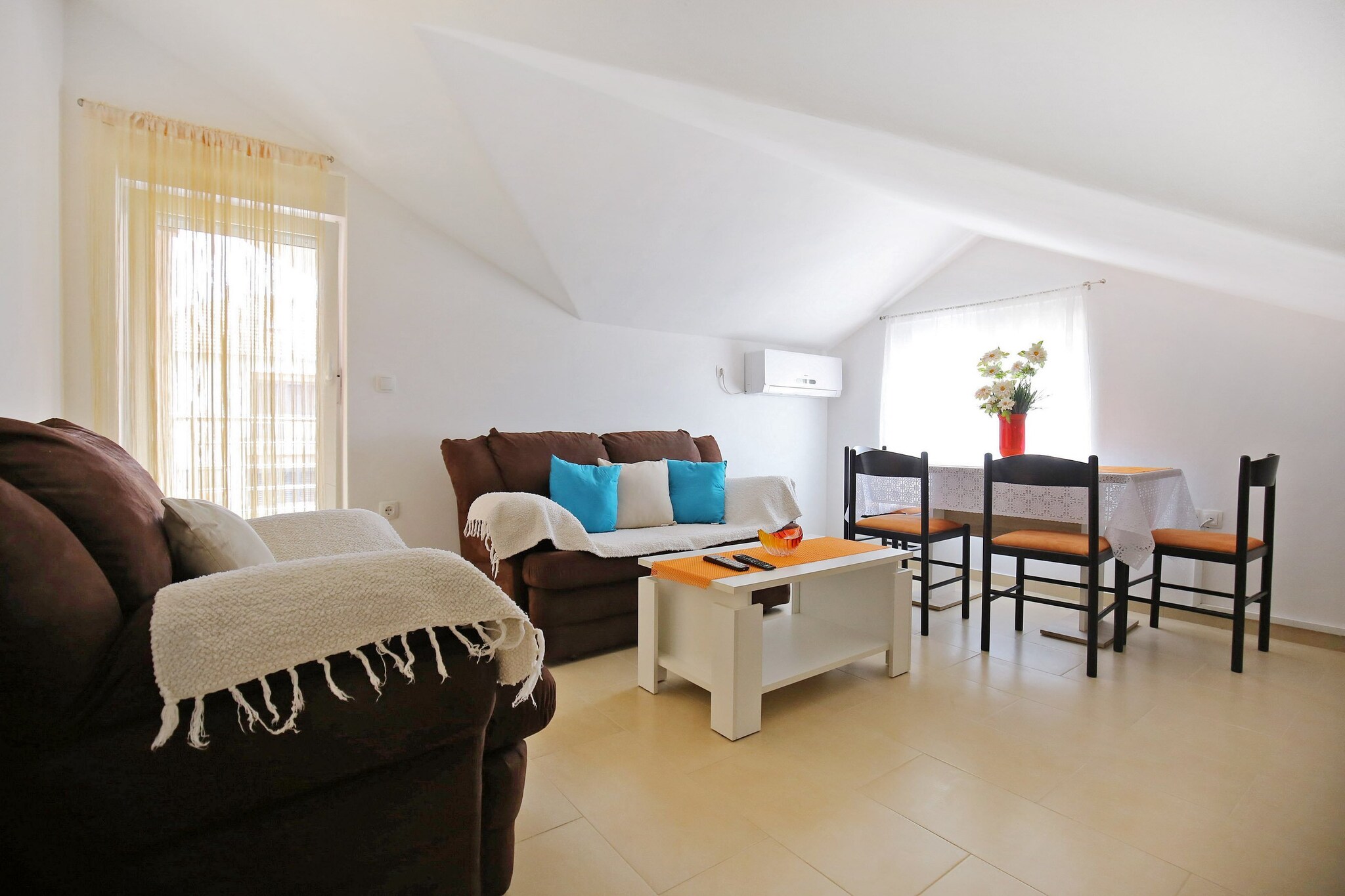 Apartments Kapetan are located in the heart of SukoÅ¡an, Zadar county, Croatia. Our modernly decorated apartments are ideal for those looking for peace, comfort, and proximity to the sea. The beach is less than 200 meters away, and everything you need - shops, pharmacies, restaurants - is just a few steps away. The famous sandy beach DjeÄji raj is perfect for families and is only 1 kilometer away from the apartments.
Note:
Private parking is available, and a reservation is not required.
Wi-Fi is available throughout the property.
Pets are not allowed.
This studio apartment can accommodate up to 2 adults and one child up to 15 years. It features an SAT/flat-screen TV and is combined with a living room seating area, sofa, and kitchen. The private bathroom is equipped with a shower and toilet.
Thanks to its excellent location, everything you'll need for your vacation is just a short walk from the property. Grocery stores, cafes, restaurants—everything is within a 300 m radius. The beach is 170 m away from the property.
The airport is 6.50 km away from the property.