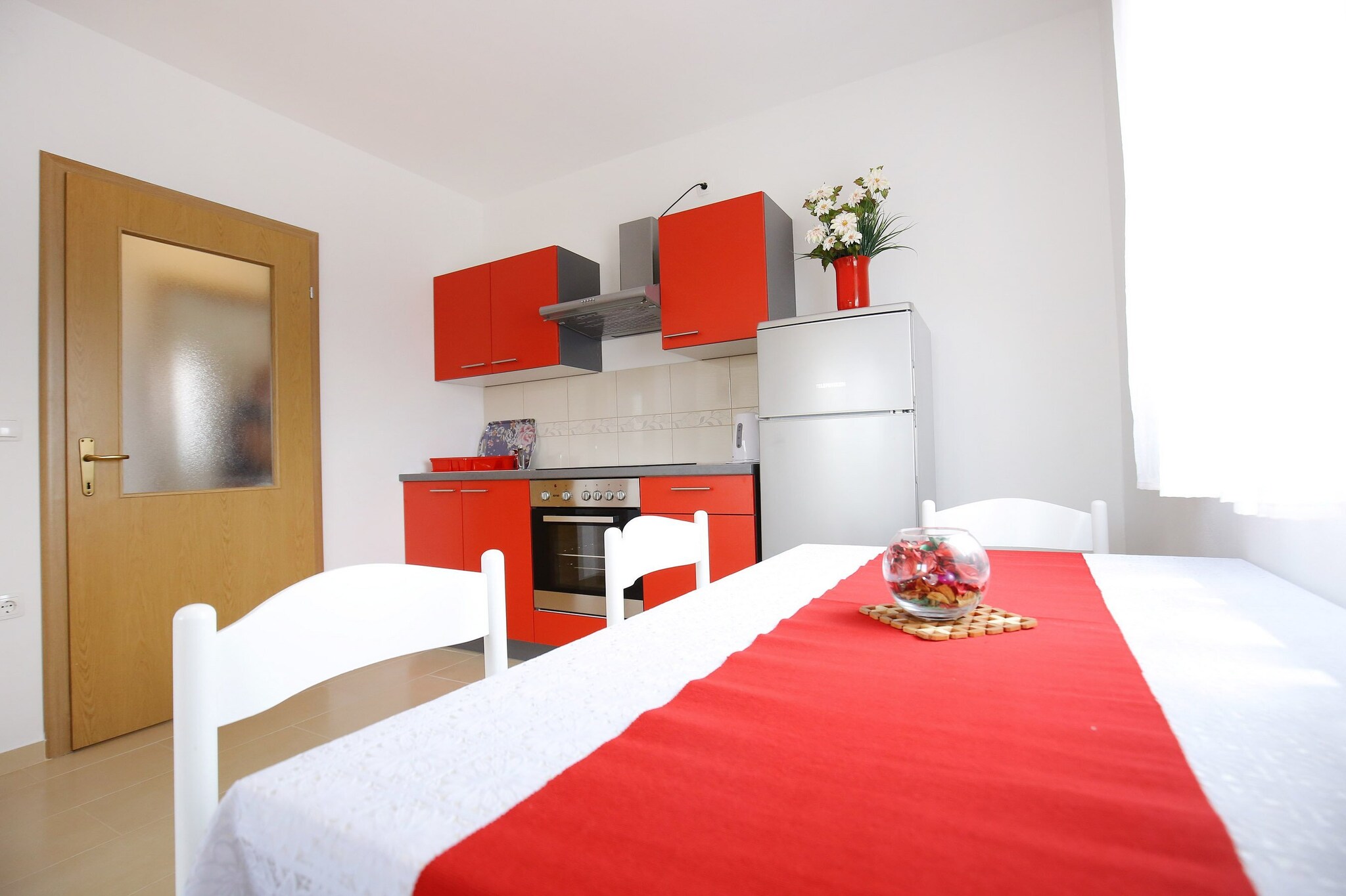 Apartments Kapetan are located in the heart of SukoÅ¡an, Zadar county, Croatia. Our modernly decorated apartments are ideal for those looking for peace, comfort, and proximity to the sea. The beach is less than 200 meters away, and everything you need - shops, pharmacies, restaurants - is just a few steps away. The famous sandy beach DjeÄji raj is perfect for families and is only 1 kilometer away from the apartments.
Note:
Private parking is available, and a reservation is not required.
Wi-Fi is available throughout the property.
Pets are not allowed.
This studio apartment can accommodate up to 2 adults and one child up to 15 years. It features an SAT/flat-screen TV and is combined with a living room seating area, sofa, and kitchen. The private bathroom is equipped with a shower and toilet.
Thanks to its excellent location, everything you'll need for your vacation is just a short walk from the property. Grocery stores, cafes, restaurants—everything is within a 300 m radius. The beach is 170 m away from the property.
The airport is 6.50 km away from the property.