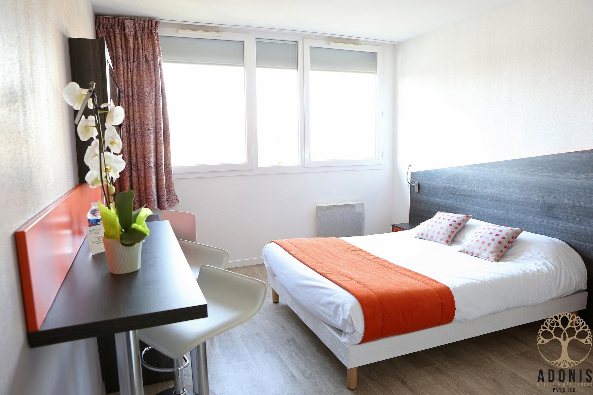 Discover the charm of Paris from the comfort of this modern apartment, perfectly located in the vibrant town of Chevilly-Larue. Just 6 km from Porte d’Italie and minutes from Orly Airport, this stylish residence in the south of Paris offers the perfect balance between convenience, comfort, and connectivity. Set within the contemporary Adonis Paris Sud hotel residence, this apartment features a sleek, fully equipped kitchenette, free Wi-Fi, and access to on-site amenities like an elevator and parking. Whether you're traveling for business, exploring iconic monuments, or simply enjoying a Parisian escape, this space offers everything you need to unwind after a full day.
The residence is located near the Villejuif - Louis Aragon Metro station (Line 7), providing direct access to central Paris and attractions such as the Eiffel Tower, Louvre Museum, and Champs-Elysees. For a change of scenery, visit nearby Versailles, stroll the gardens of Vincennes, or explore the culinary richness of the famous Rungis market, just minutes away.
Each apartment blends function and comfort with urban design elements, offering a private, peaceful retreat just outside the city bustle. Whether you're staying for a weekend or a longer adventure, this apartment at Adonis Paris Sud is the ideal base for discovering the magic of Paris and its surroundings.