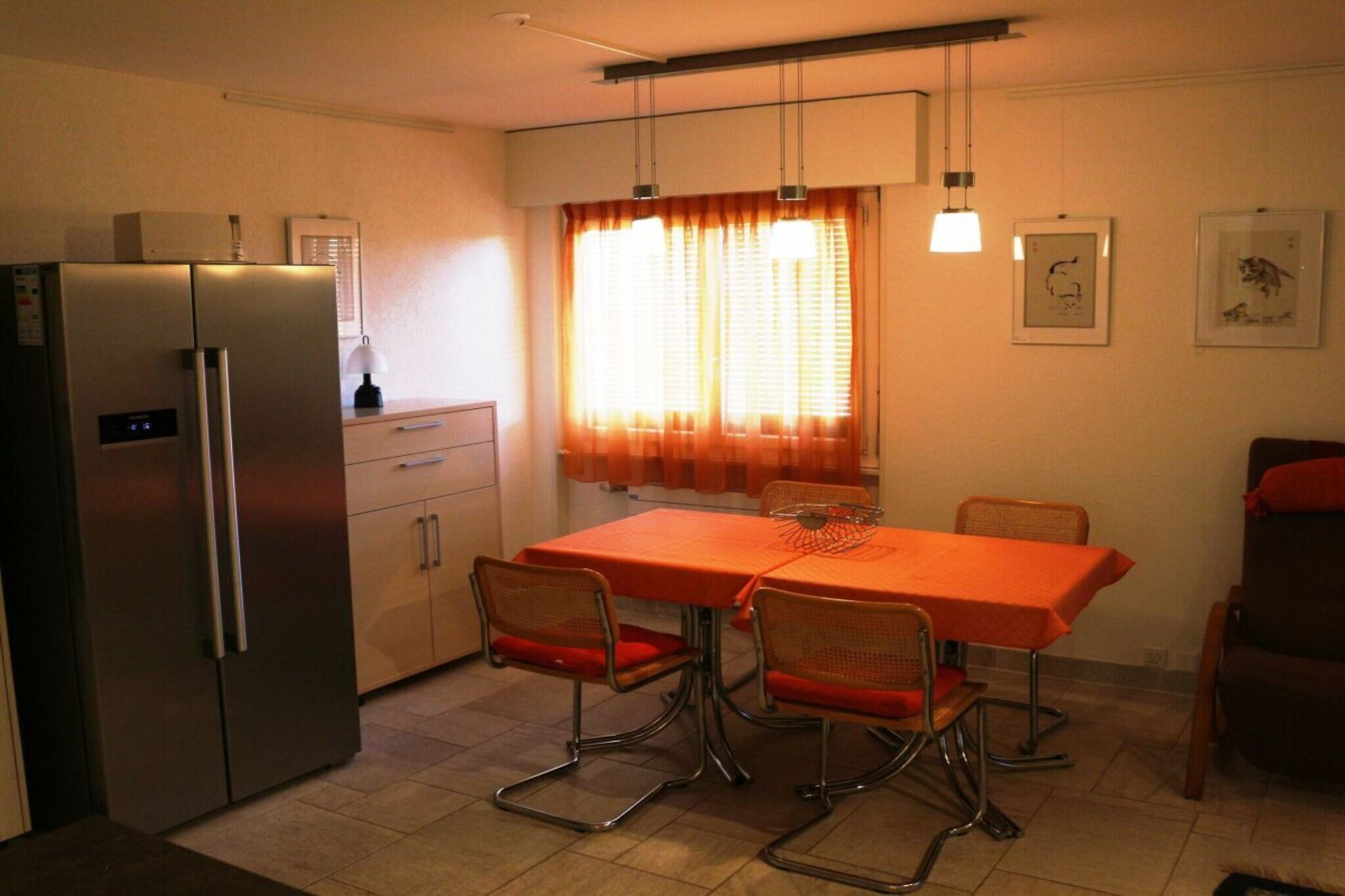 mezzanine: (Living room(Armchair, Sofa, single sofa bed, TV, radio), bedroom(Bed Linen, Mirror, Wardrobe, single bed, single bed), bedroom(Bed Linen, Wardrobe, single bed, single bed))\n\nHot Water, Vacuum Cleaner, Kitchen(Mixer, Tea Towels, Wardrobe Coatrack, Kitchenette, dining table, hob, electric kettle, coffee machine, oven, grill, grill, microwave, dishwasher, freezer), bathroom(Mirror, toilet, bath tub, shower, washbasin, hairdryer), drying room(Vacuum Cleaner, toilet, tumble dryer, washbasin, washing machine, ironing board, iron, drying cabinet), Internet access, tumble dryer, washing machine, balcony, heating, terrace(Sun Umbrella, Lawn, grill, garden furniture, sun loungers), parking, drying cabinet