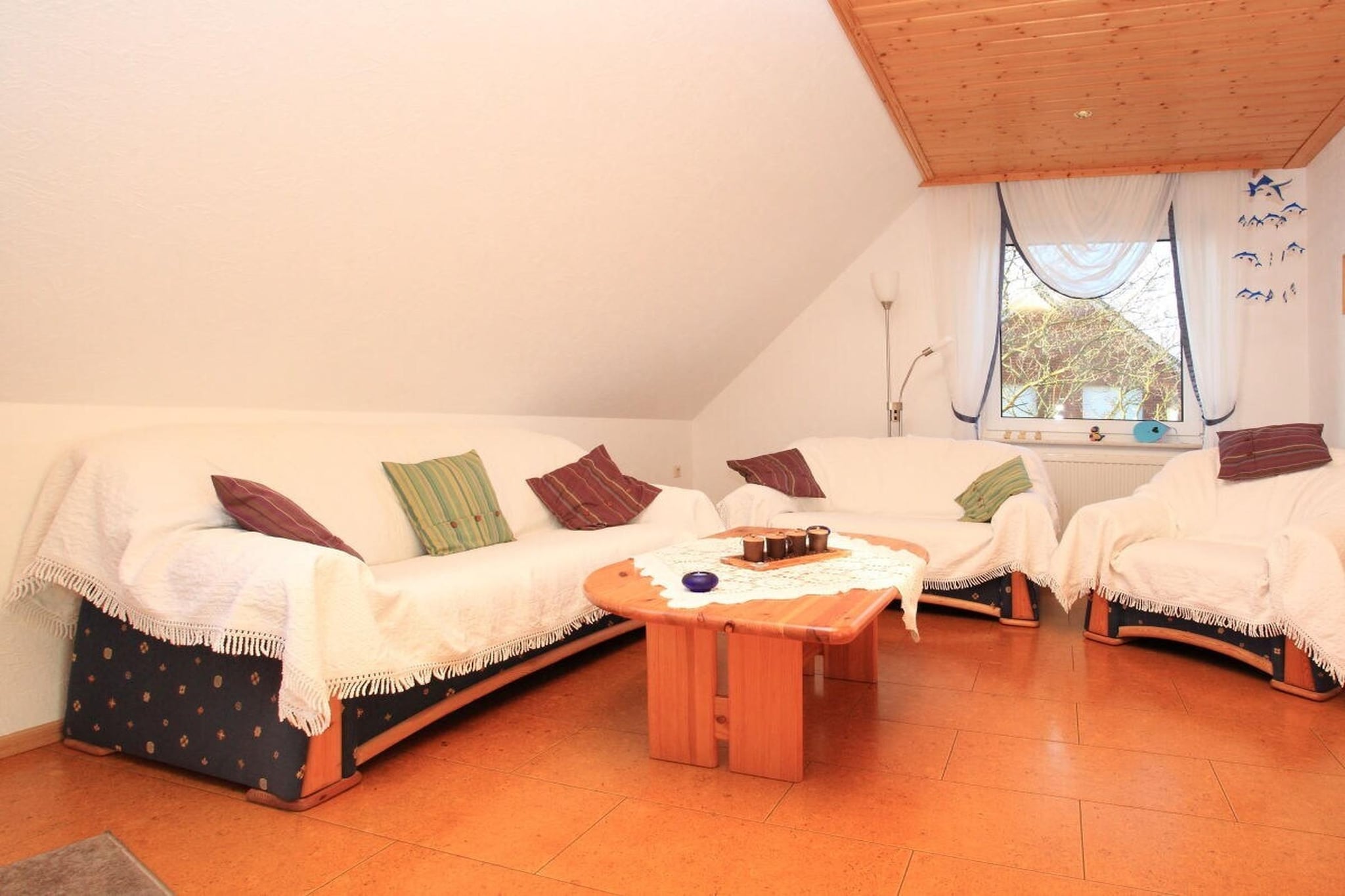 Vacuum Cleaner, hallway(Mirror, Wardrobe Coatrack), Living room(Armchair, TV), Kitchen(hob, oven, dishwasher, fridge), bedroom(Bed Linen, Wardrobe, double bed), bedroom(single bed, single bed, cot), bathroom(Mirror, toilet, shower, washbasin), carport, Internet access, First Aid, tumble dryer, washing machine, heating, drying cabinet