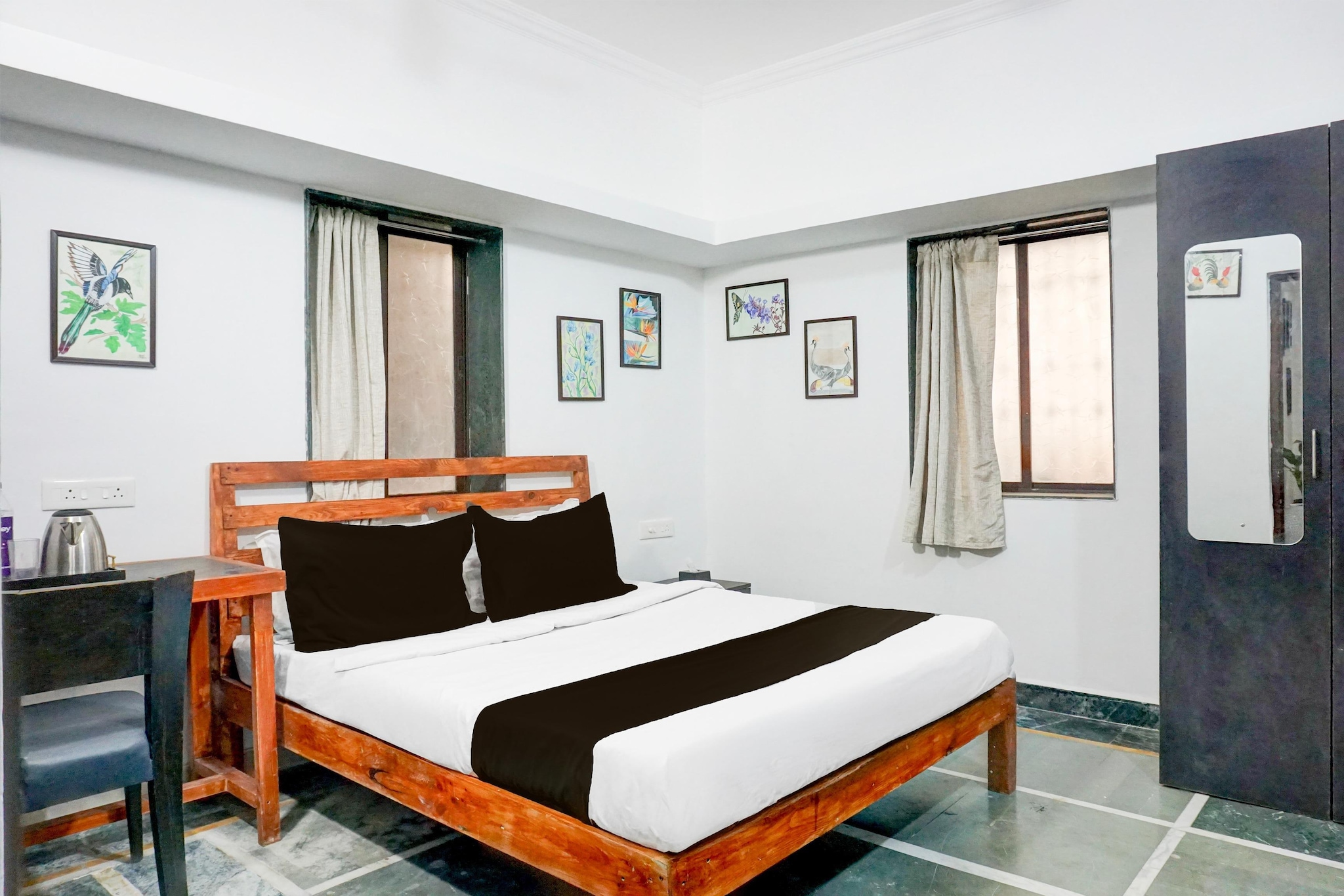 Comfortable Accommodations: Collection O Baner Near Mumbai Pune Highway in Pune offers family rooms with air-conditioning, private bathrooms, work desks, and free toiletries. Each room includes a TV, wardrobe, and tiled floors.

Dining Experience: The family-friendly restaurant serves Indian cuisine for lunch and dinner. Guests can enjoy meals in a welcoming ambience.

Convenient Facilities: The hotel provides free WiFi throughout, a lift, 24-hour front desk, housekeeping service, room service, and luggage storage.

Nearby Attractions: Pune International Airport is 20 km away. Points of interest include University of Pune (9 km), Pataleshwar Cave Temple (11 km), and Bund Garden (15 km).

Unmarried couples are warmly welcome at this property.
Guests with local ID proof are warmly welcome.

Early Check-In Policy: A full dayâ€™s room rate will be charged for check-ins before 6:00 AM. Complimentary early check-in is available between 6:00 AM and 10:00 AM, subject to room availability.
Check-in is only available to guests aged 18 and above. Please provide a government-issued ID to confirmÂ yourÂ age.