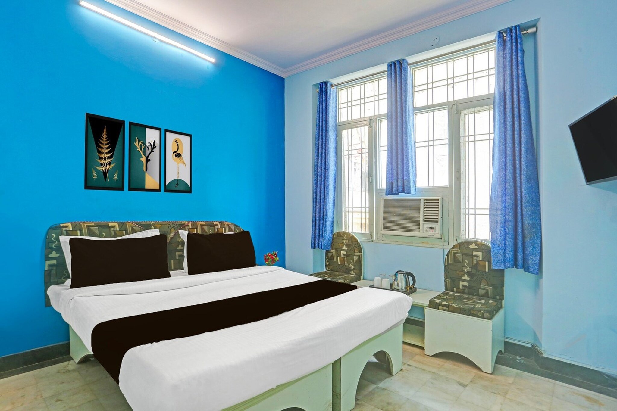 Comfortable Accommodations: Super Collection O Bani Park Near Collectorate Circle Formerly Anuja Palace in Jaipur offers family rooms with air-conditioning, private bathrooms, work desks, and seating areas. Each room includes free toiletries, a bath or shower, TV, and tiled floors.

Essential Facilities: Guests enjoy free WiFi throughout the property, a lift, 24-hour front desk, housekeeping service, room service, and luggage storage. Free on-site private parking is available.

Convenient Location: Located 15 km from Jaipur International Airport, the hotel is situated in Banipark, Kanti Nagar, Sindhi Camp. Reception staff speak English and Hindi.

Unmarried couples are warmly welcome at this property.

Guests with local ID proof are warmly welcome.

Early Check-In Policy: A full day’s room rate will be charged for check-ins before 6:00 AM. Complimentary early check-in is available between 6:00 AM and 10:00 AM, subject to room availability.

Check-in is only available to guests aged 18 and above. Please provide a government-issued ID to confirm your age.


