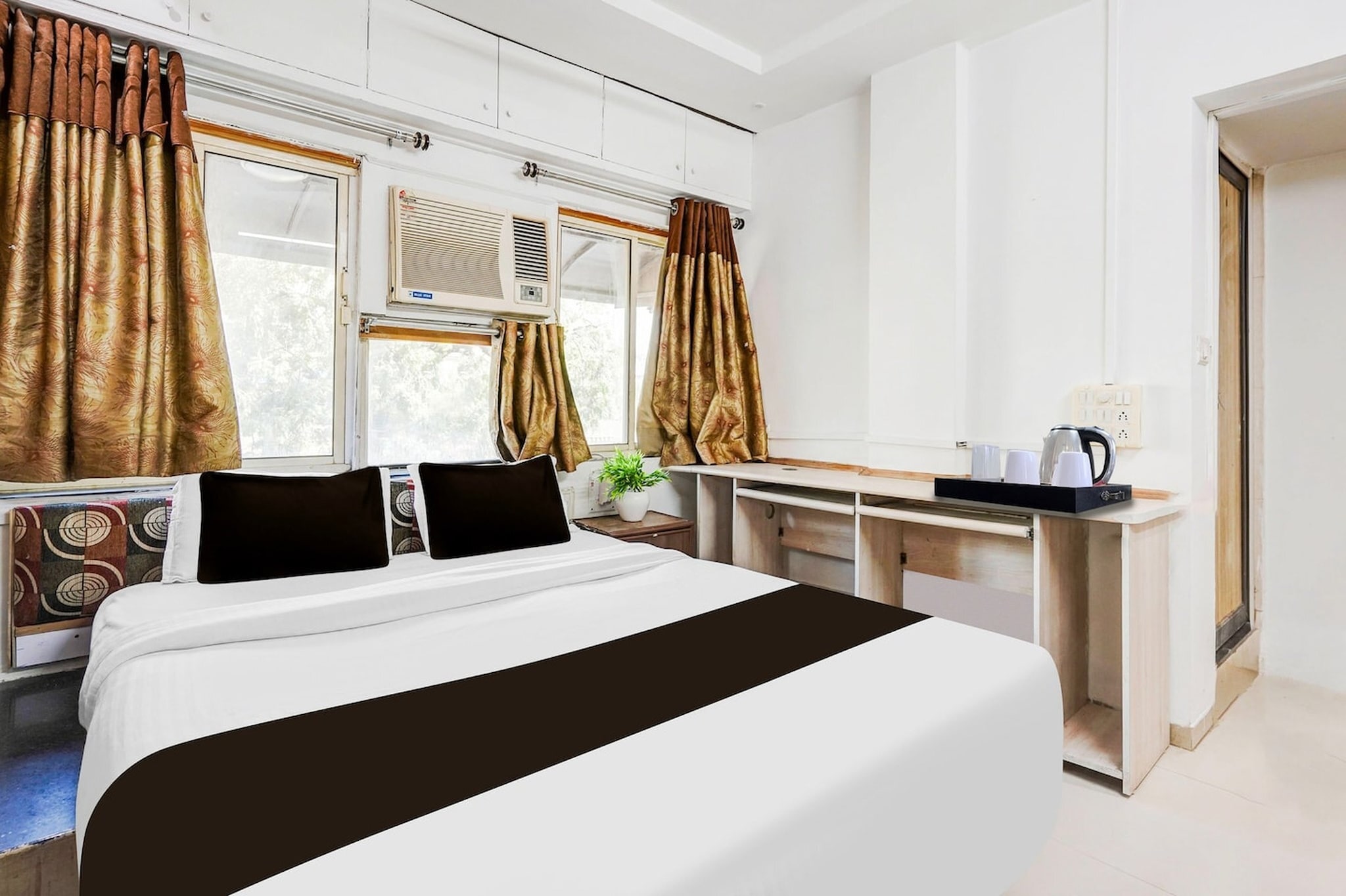 Comfortable Accommodations: Super Collection O Maninagar East Formerly Maninagar Residency in Ahmedabad offers family rooms with air-conditioning, private bathrooms, work desks, and seating areas. Each room includes free toiletries, a bath or shower, TV, and tiled floors.
Essential Facilities: Guests enjoy free WiFi throughout the property, a 24-hour front desk, housekeeping, laundry, room service, and luggage storage. Free on-site parking is available.
Convenient Location: Located 9 km from Sardar Vallabhbhai Patel International Airport, the hotel is near attractions such as Gandhi Ashram and IIM, both 11 km away. Kankaria Lake is 2 km from the property.
We’re sorry, but we are unable to accommodate unmarried couples at this property.
We’re sorry, but guests with local ID proof are not welcome at this property.
Apologies, but we are currently unable to host foreign nationals at this property.
Early Check-In Policy: A full day’s room rate will be charged for check-ins before 6:00 AM. Complimentary early check-in is available between 6:00 AM and 10:00 AM, subject to room availability.
Check-in is only available to guests aged 18 and above. Please provide a government-issued ID to confirm your age.