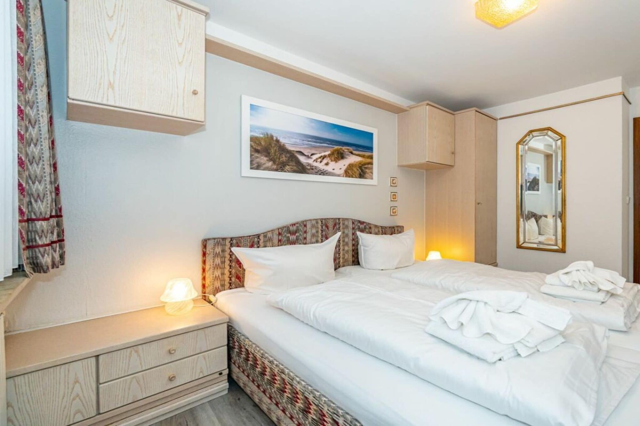 Vacuum Cleaner, Living room(Sofa, TV, CD player), Kitchen(Kitchenette, electric kettle, toaster, coffee machine), bedroom(double bed), bathroom(toilet, shower, washbasin, hairdryer), balcony(garden furniture), parking
