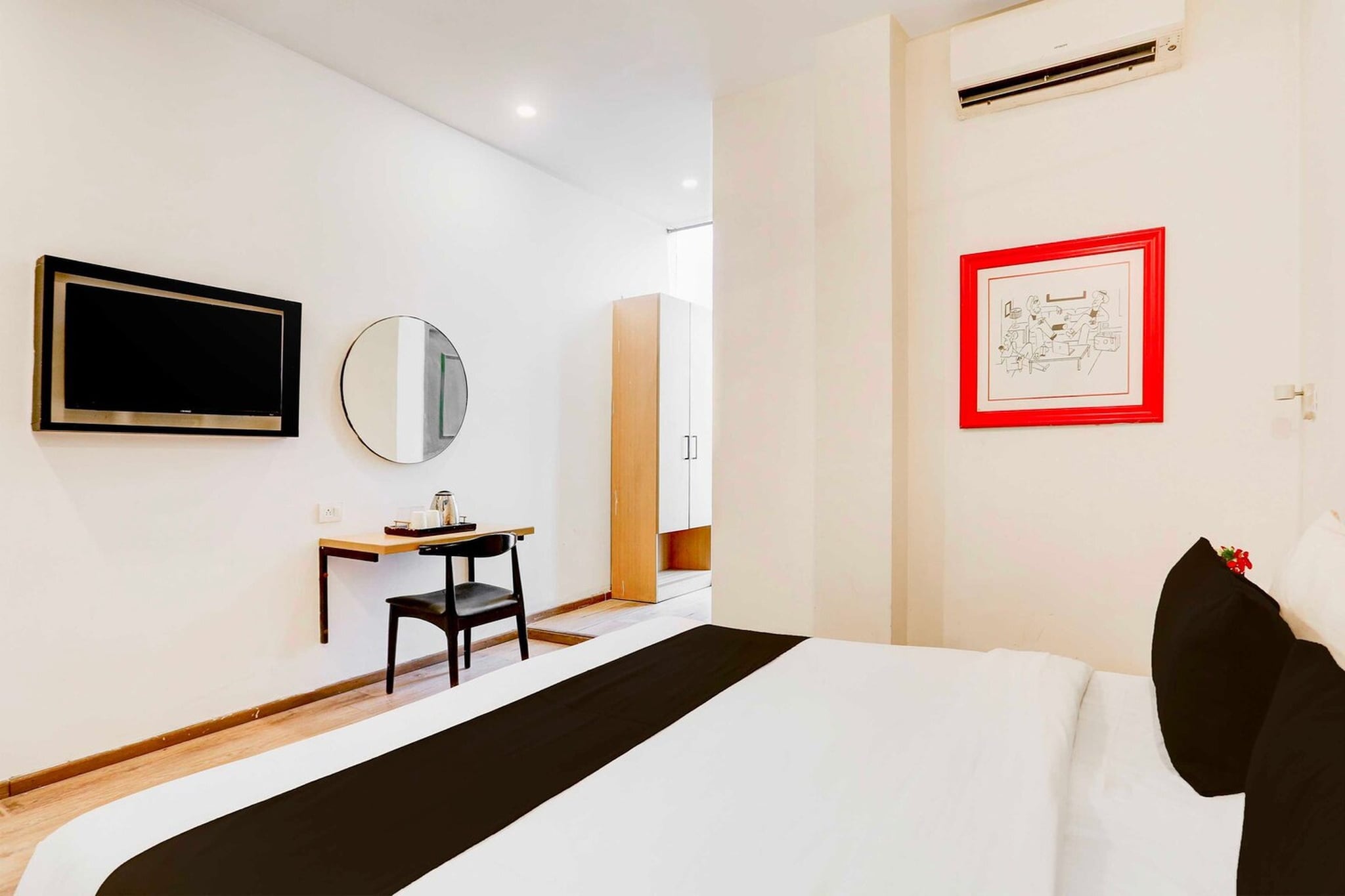 Comfortable Accommodations: Super Collection O Sector 64 Near WorldMark Gurgaon in Gurgaon offers family rooms with air-conditioning, private bathrooms, work desks, and seating areas. Each room includes free toiletries, a bath or shower, TV, tiled floors, and a wardrobe.

Essential Facilities: Guests enjoy free WiFi throughout the property, a lift, 24-hour front desk, housekeeping service, room service, and luggage storage. The hotel provides a work desk and a seating area for added convenience.

Prime Location: Located 21 km from Delhi International Airport, the hotel is a 3-minute walk from WorldMark Gurgaon. Nearby attractions include MG Road (12 km), Qutub Minar (22 km), and India Gate (33 km).

Unmarried couples are warmly welcome at this property.
Guests with local ID proof are warmly welcome.

Early Check-In Policy: A full day's room rate will be charged for check-ins before 6:00 AM. Complimentary early check-in is available between 6:00 AM and 10:00 AM, subject to room availability.
Check-in is only available to guests aged 18 and above. Please provide a government-issued ID to confirm your age.
