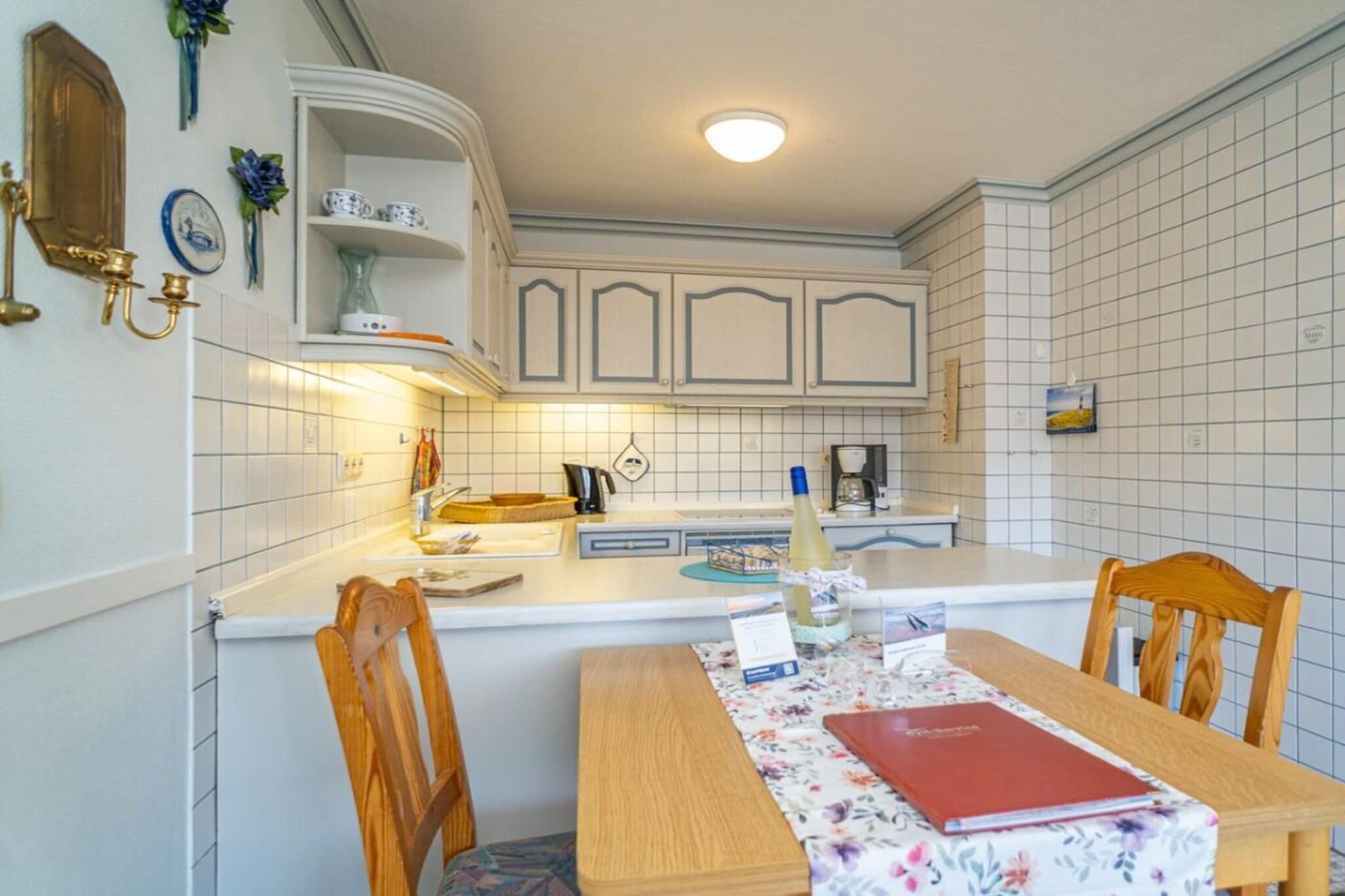 Living room(Sofa, TV, radio, stereo unit), Kitchen(hob, electric kettle, coffee machine, microwave, dishwasher, fridge), bedroom(double bed), bathroom(Mirror, toilet, shower, washbasin), Internet access, balcony(garden furniture), parking