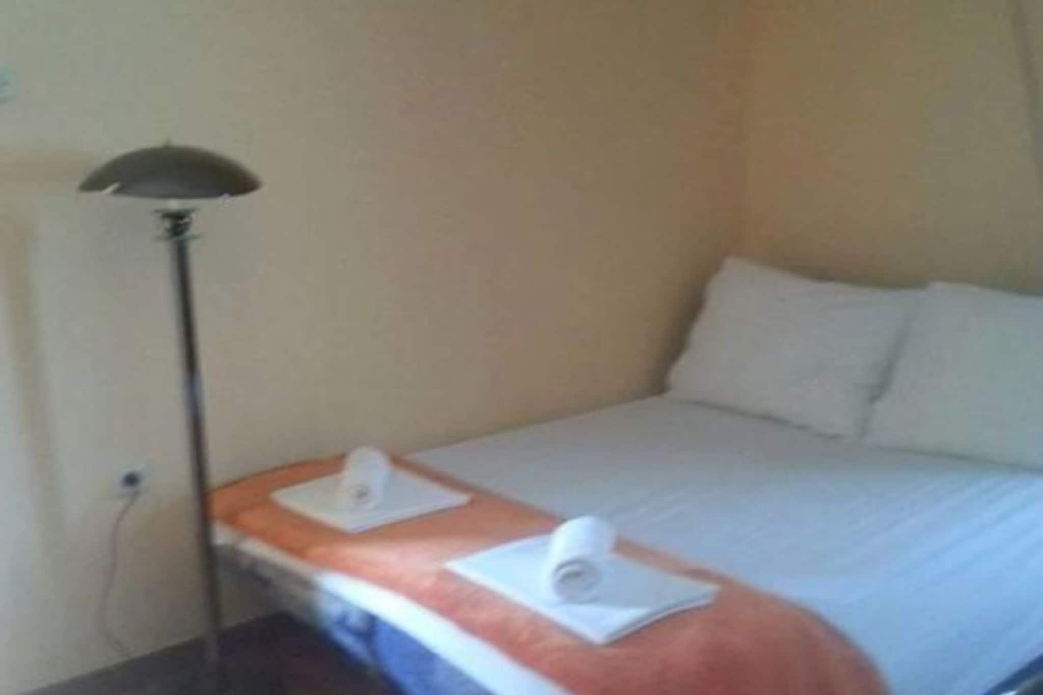 Apartments Štrbić - One Bedroom Apartment - Mely-Schlafzimmer