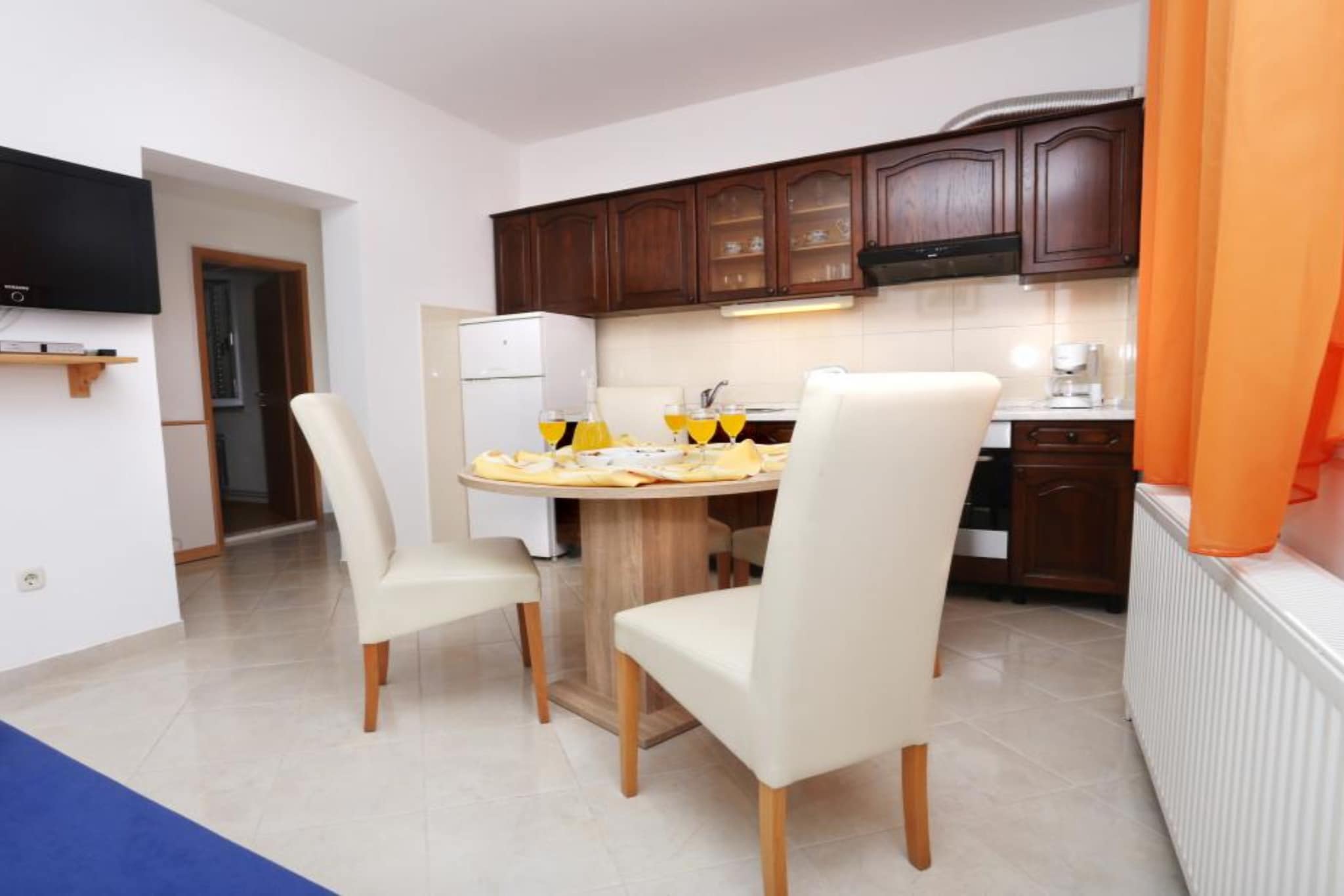 Apartments Antonio in Trogir, Split-Dalmatia County, Croatia, offer comfortable accommodations near the Adriatic Sea. Situated approximately 300 meters from MiÅ¡evac Beach and less than 1 kilometer from Mastrinka Beach, the property provides easy access to coastal attractions. 

Note:
Private parking is available, and a reservation is not required.
Wi-Fi is available throughout the property.
Pets are not allowed.

This one-bedroom can accommodate up to four guests. It features a satellite TV. The private bathroom is equipped with a shower and toilet.

Thanks to its excellent location, everything you'll need for your vacation is just a short walk from the property. Grocery stores, cafes, restaurantsâ€”everything is within a 300 m radius. The beach is 50 m away from the property.

The airport is 8 km away from the property.