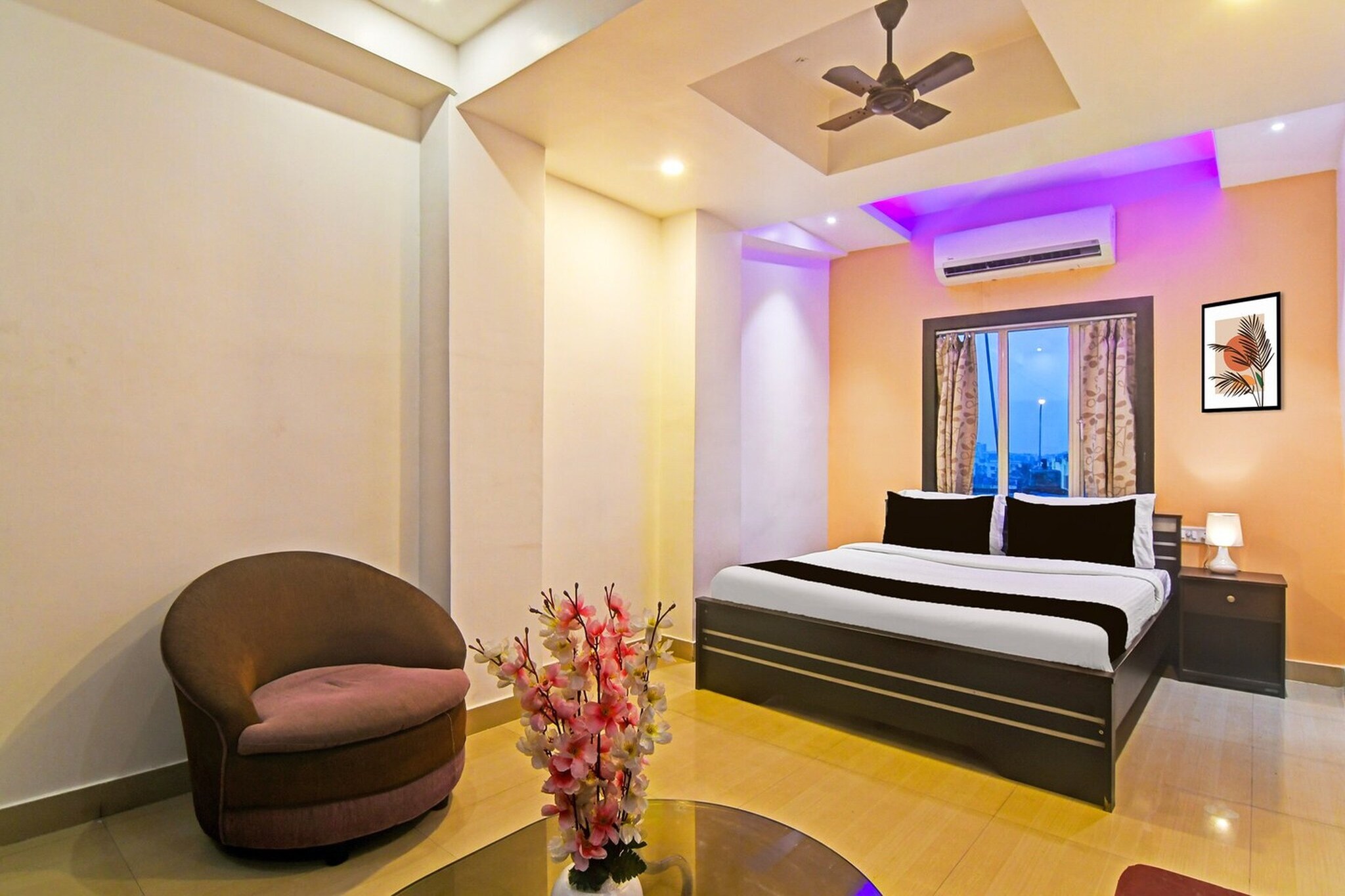 Comfortable Accommodations: Super Hotel O Baguiati in Kolkata offers family rooms with air-conditioning, private bathrooms, and free WiFi throughout the property. Each room includes a work desk, seating area, TV, and wardrobe.

Convenient Facilities: Guests can enjoy a lounge, lift, 24-hour front desk, shared kitchen, housekeeping service, and room service. Additional amenities include free toiletries, shower, and a fireplace.

Dining Options: A continental and Ã  la carte breakfast is available each morning. The hotel also provides room service for added convenience.

Prime Location: Located 5 km from Netaji Subhash Chandra Bose International Airport, the hotel is near Dumdum Metro Station (6 km), M G Road Metro Station (9 km), and Sealdah Railway Station (10 km). Highly rated by guests.

Unmarried couples are warmly welcome at this property.
Guests with local ID proof are warmly welcome.

"Early Check-In Policy: A full dayâ€™s room rate will be charged for check-ins before 6:00 AM. Complimentary early check-in is available between 6:00 AM and 10:00 AM, subject to room availability.
Check-in is only available to guests aged 18 and above. Please provide a government-issued ID to confirmÂ yourÂ age.

